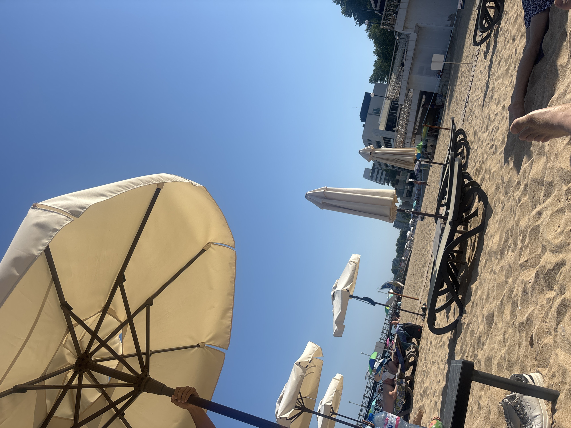 Lazy afternoon under beach umbrellas on Varna's sunny shore