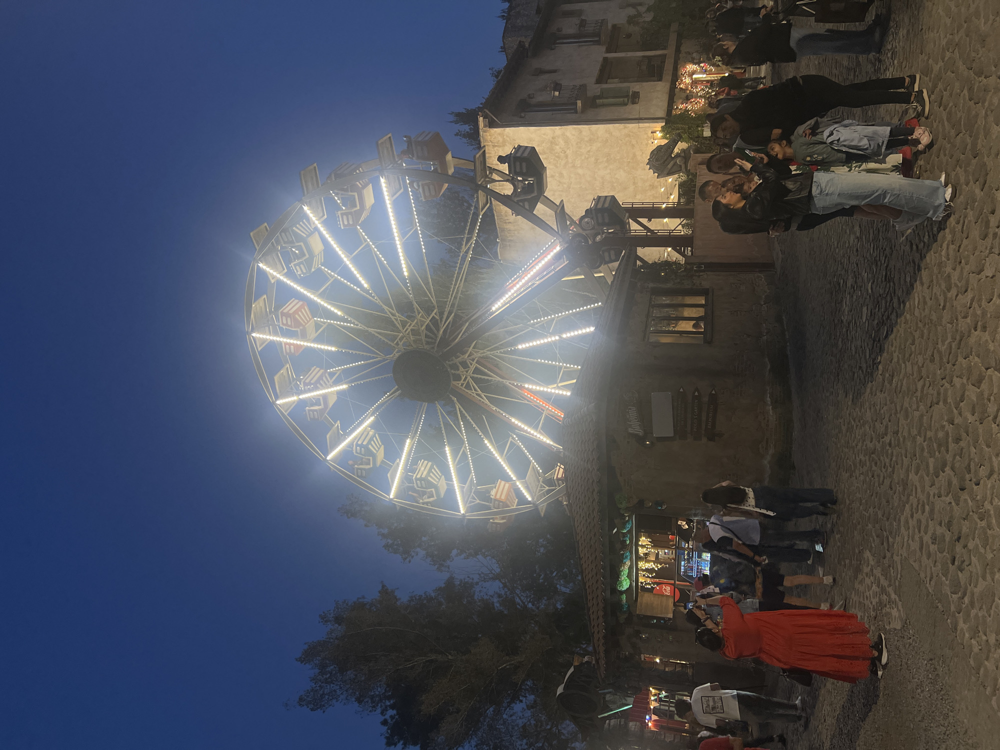 Illuminated carnival rides draw crowds in Domingo Arenas