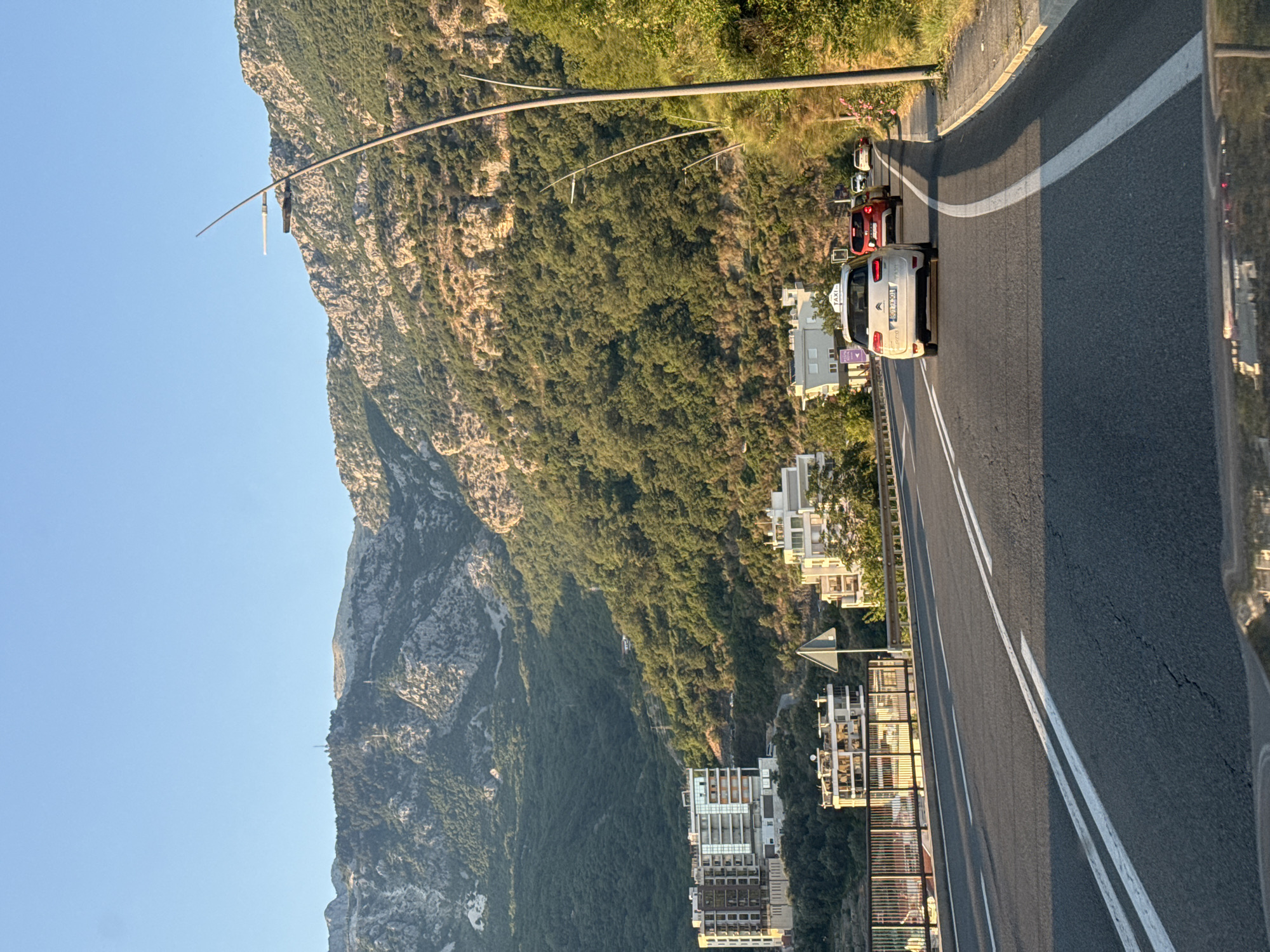 Afternoon traffic on a marked road in Rafailovići, Montenegro