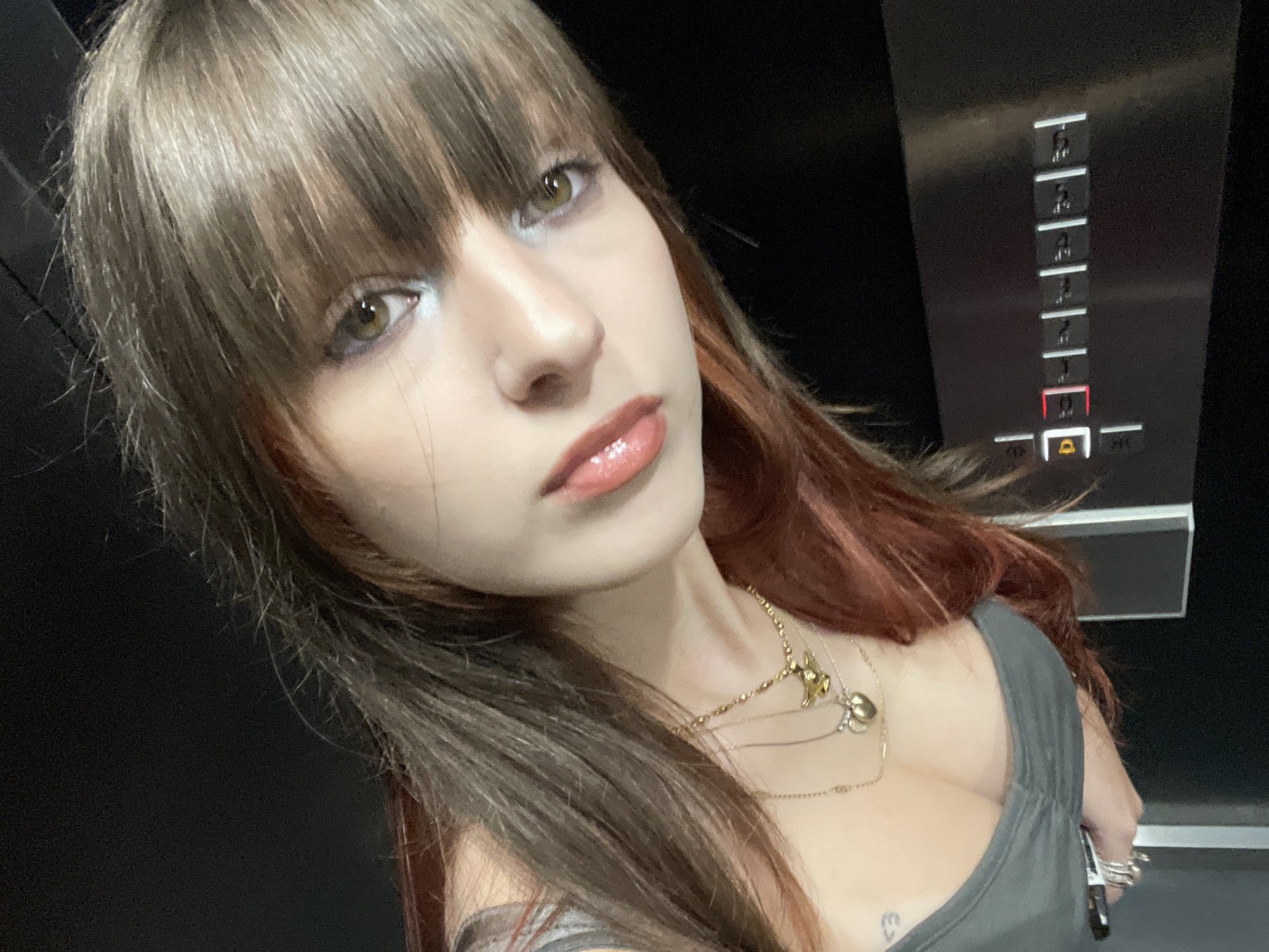 Woman takes elevator selfies in Raanana, Israel