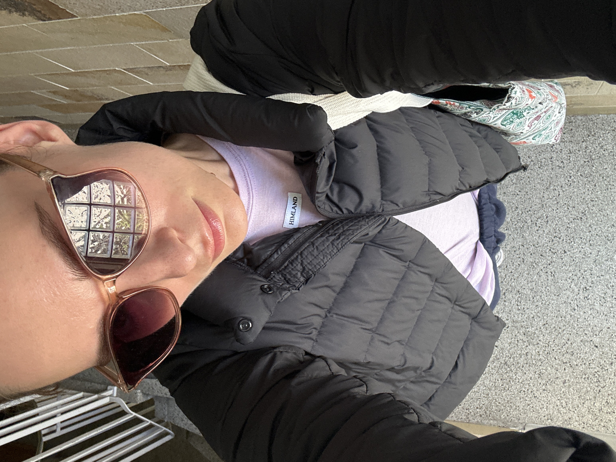Woman takes selfies indoors in Kiel, Germany