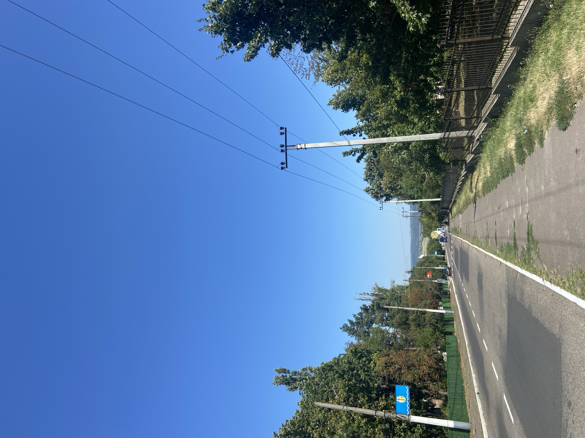 Clear-sky street scene on a quiet Eastern European road