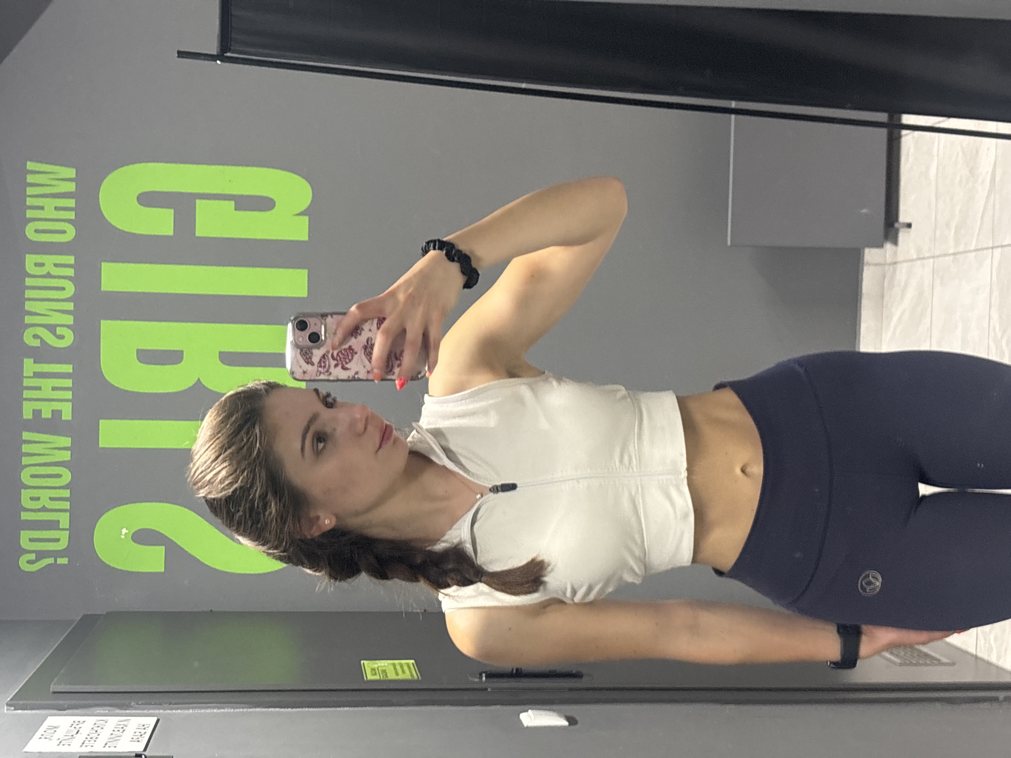Woman takes gym selfies in Varna fitness facility