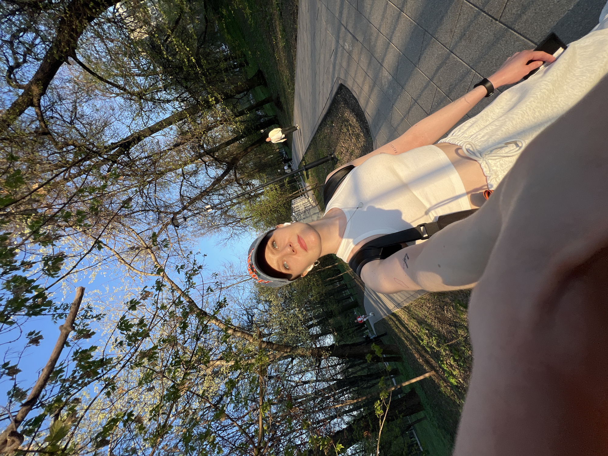 Two people spotted on pathways, one wheelchair-bound, another taking selfie