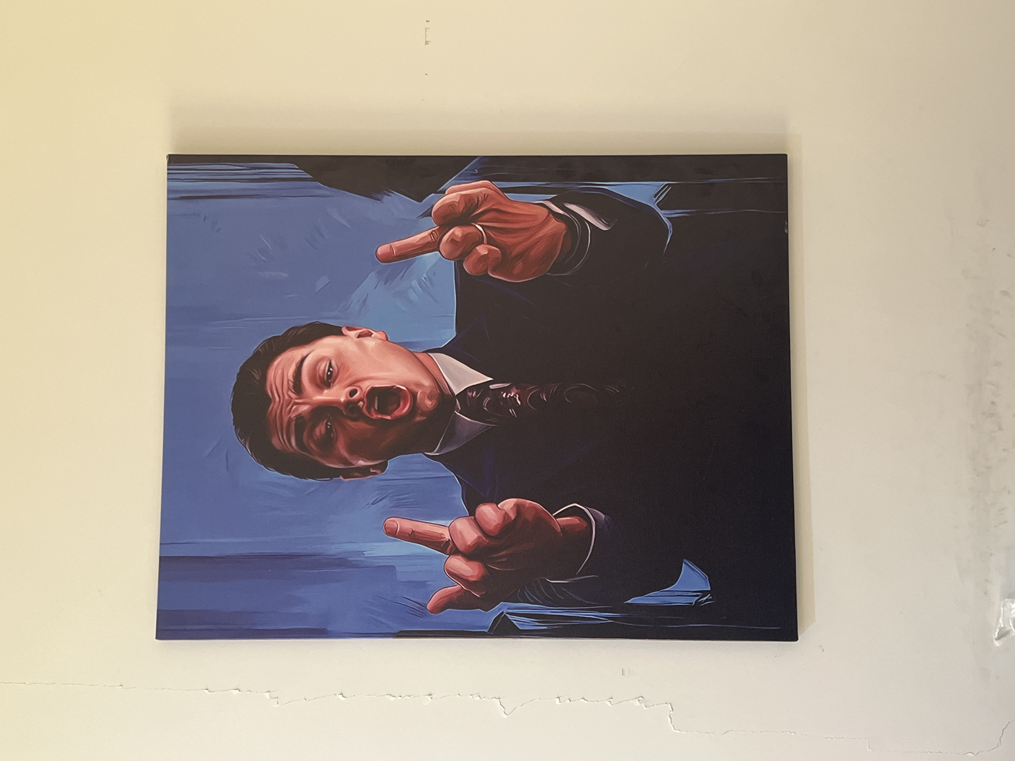 Provocative painting of suited man making gesture spotted in Astana