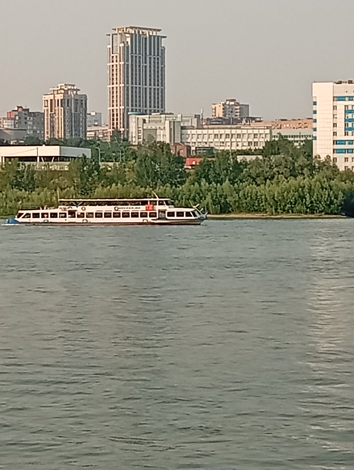 River, rooftops, and everyday interiors across a Novosibirsk morning
