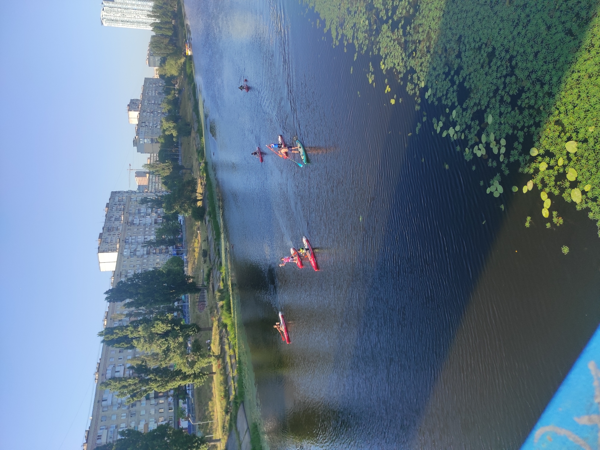 Kyiv riverside and streets on a sunny summer afternoon