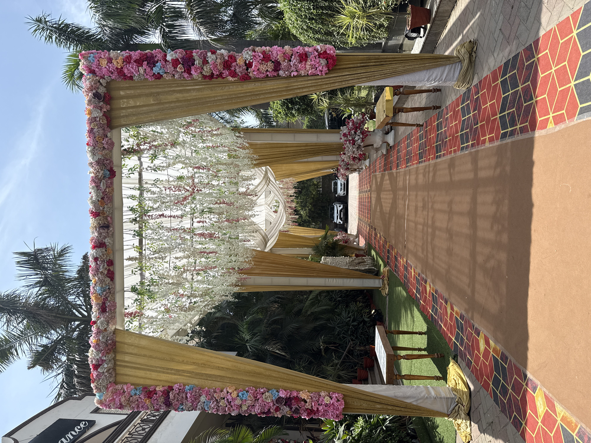 Wedding mandap with floral decorations observed in Delhi
