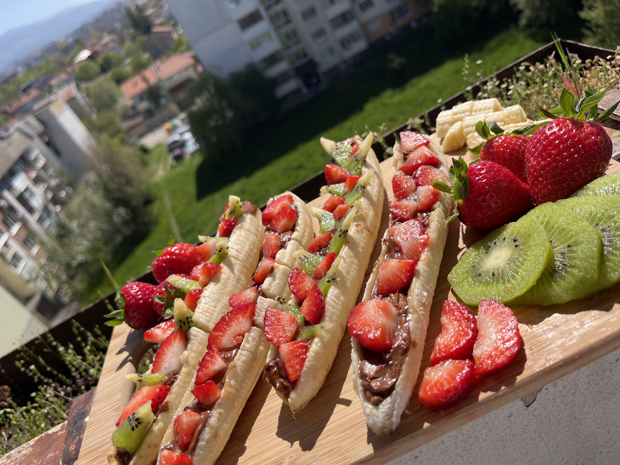 Sofia resident documents homemade banana boat desserts on sunny afternoon