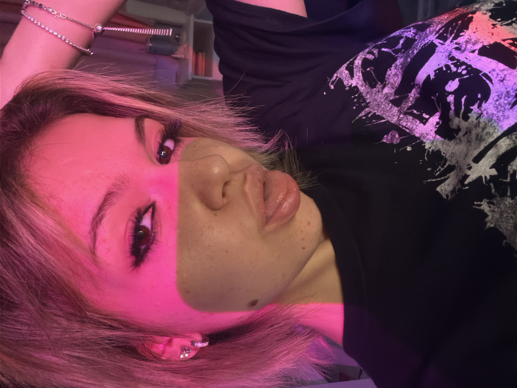 Individual photographs selfies in colorful lighting in Bulgarian bedroom