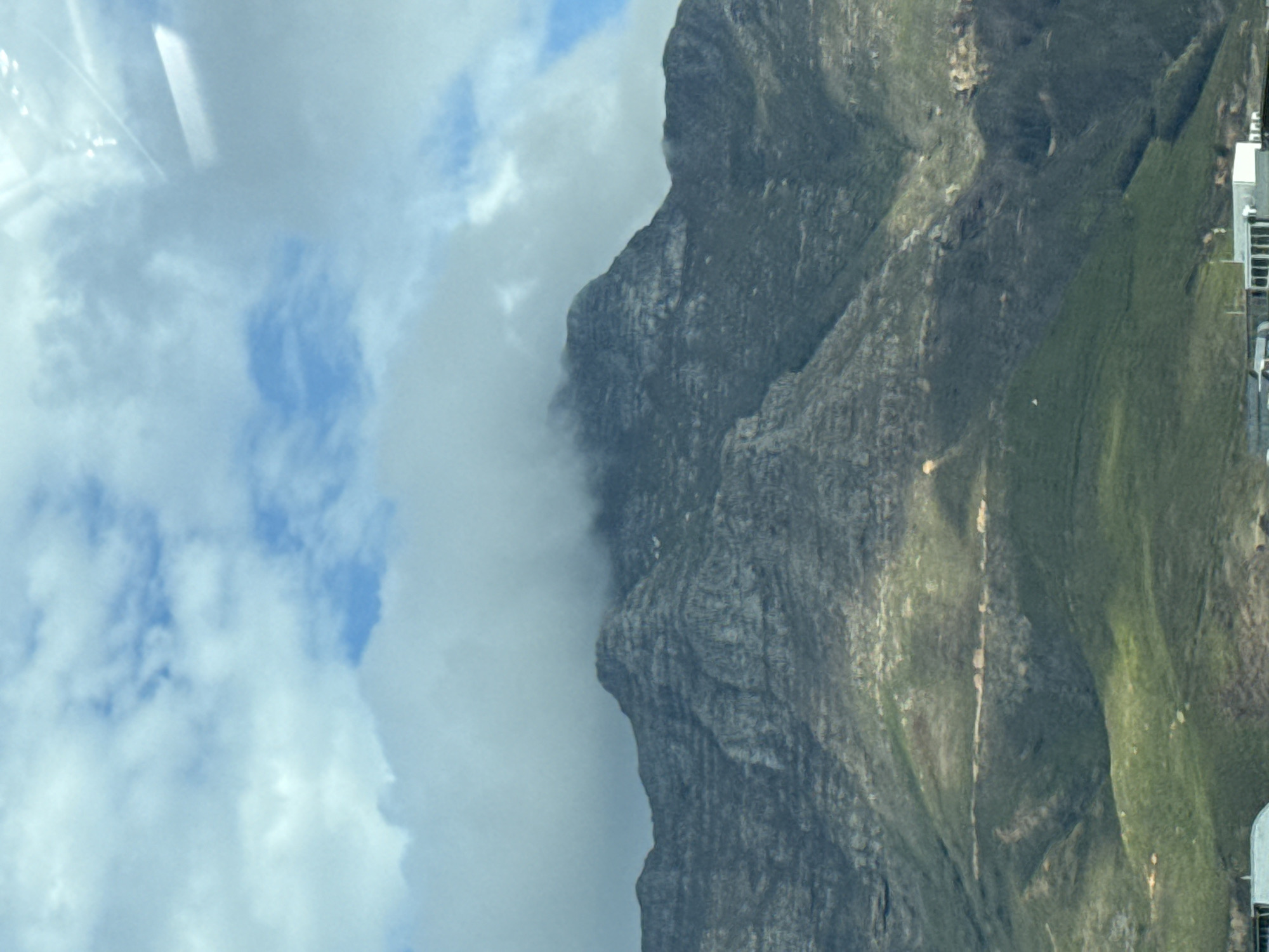 Table Mountain partially clouded over Cape Town afternoon
