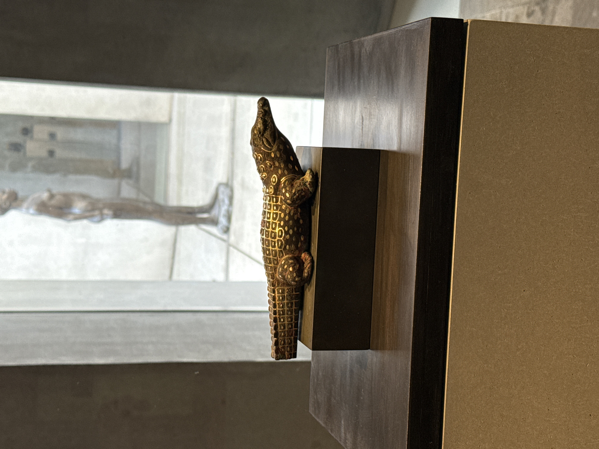 Visitor documents Egyptian artifacts at Munich museum Friday morning
