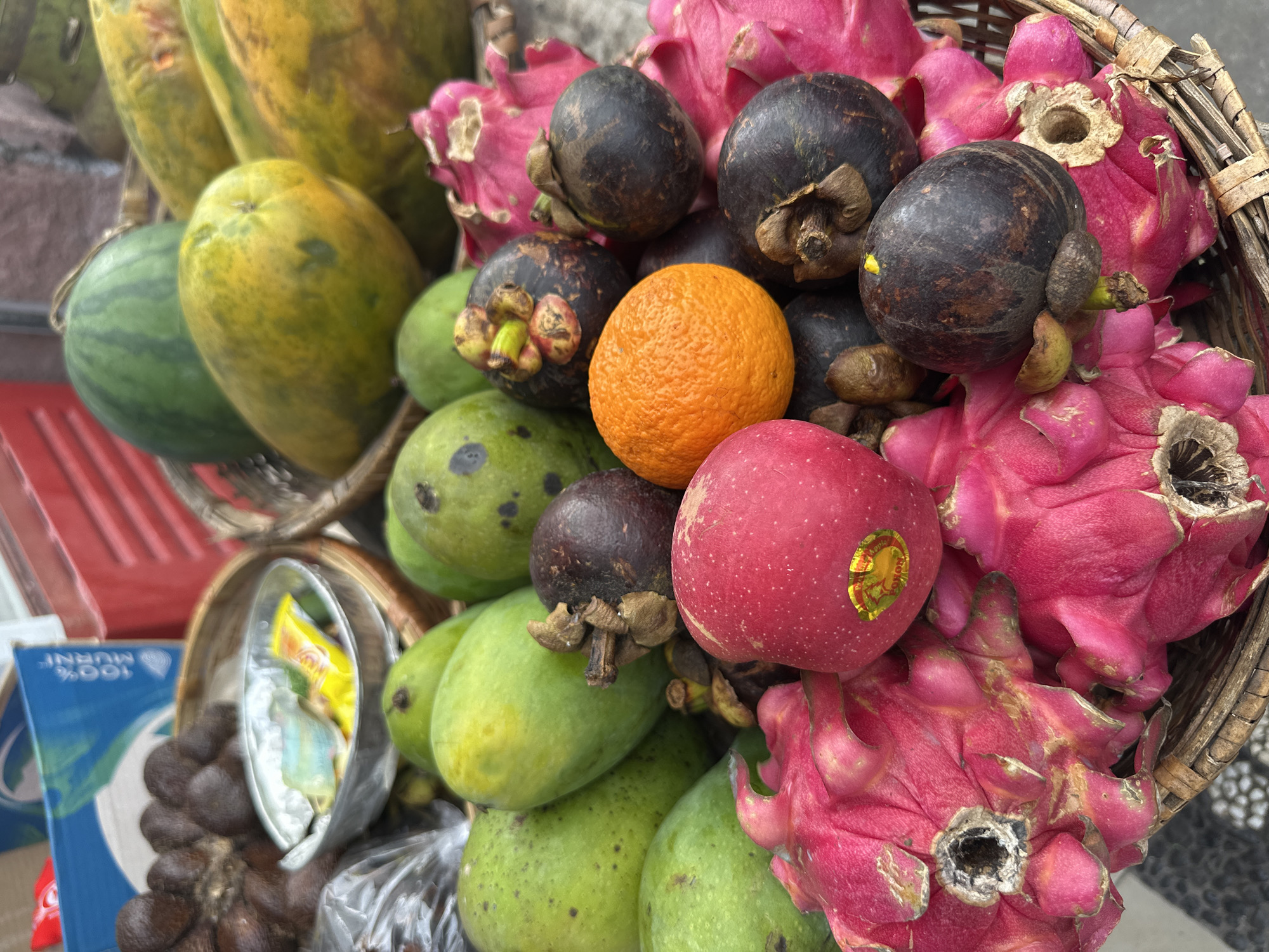 Tropical fruit display and local snacks spotted in Ubud