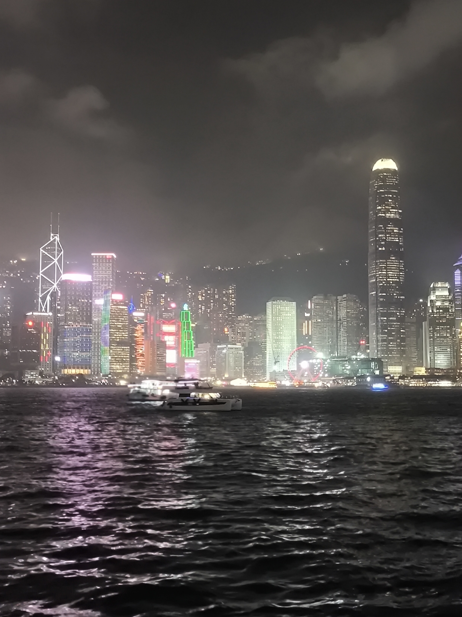 Evening activity around Victoria Harbour draws crowds and sightseers
