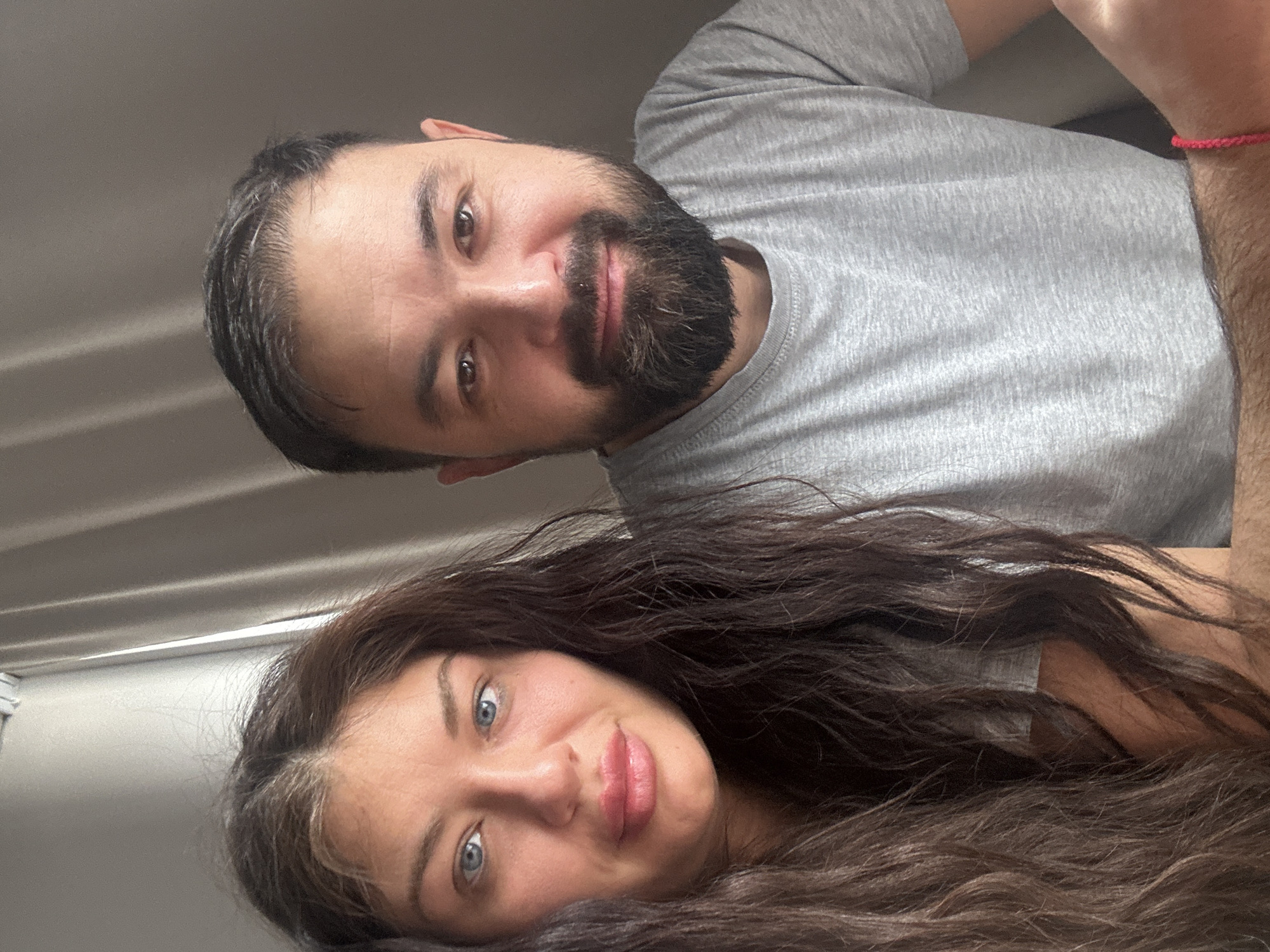 Couple photographed together indoors in Moscow