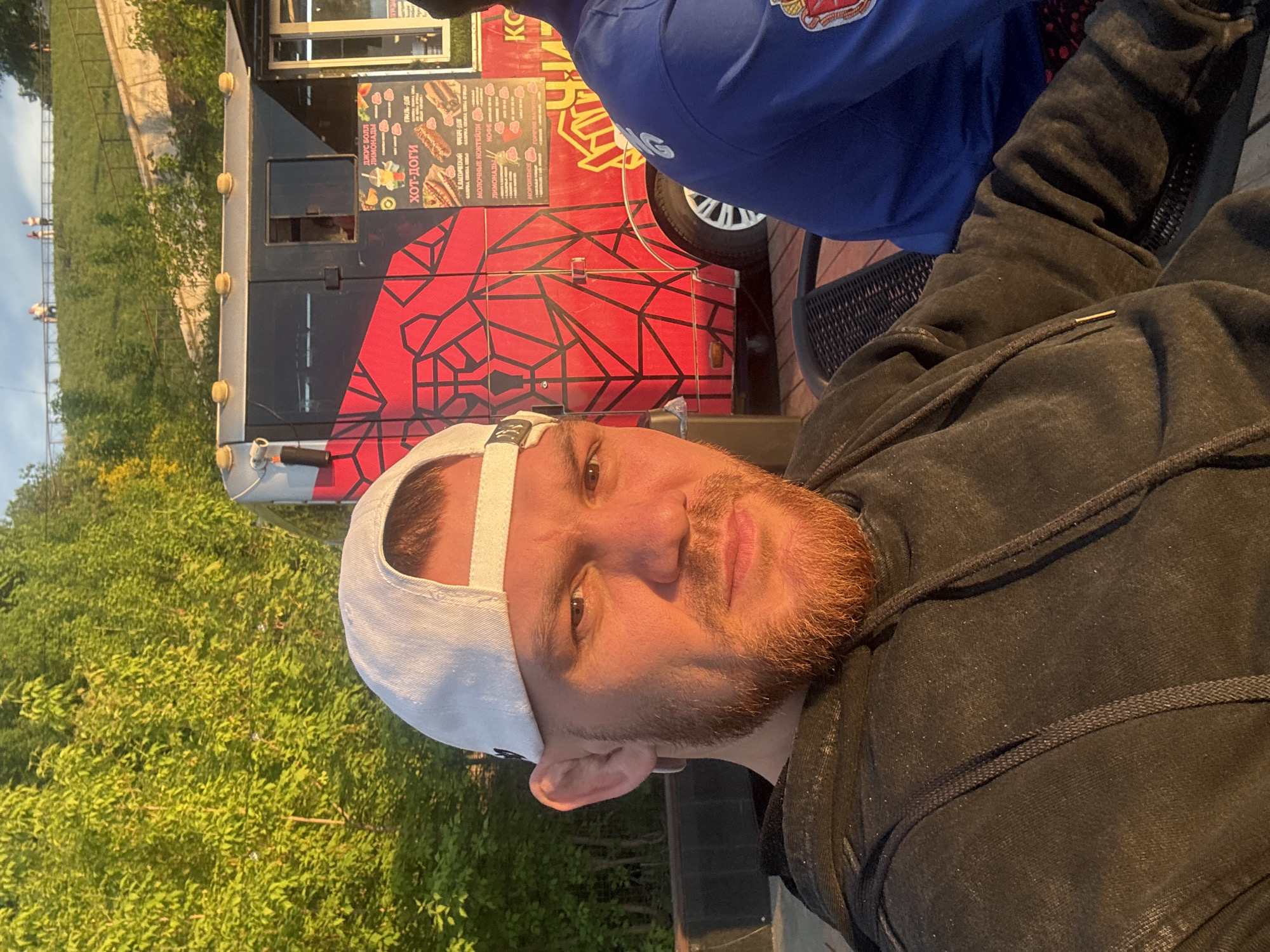 Man takes selfie near juice truck in Perm