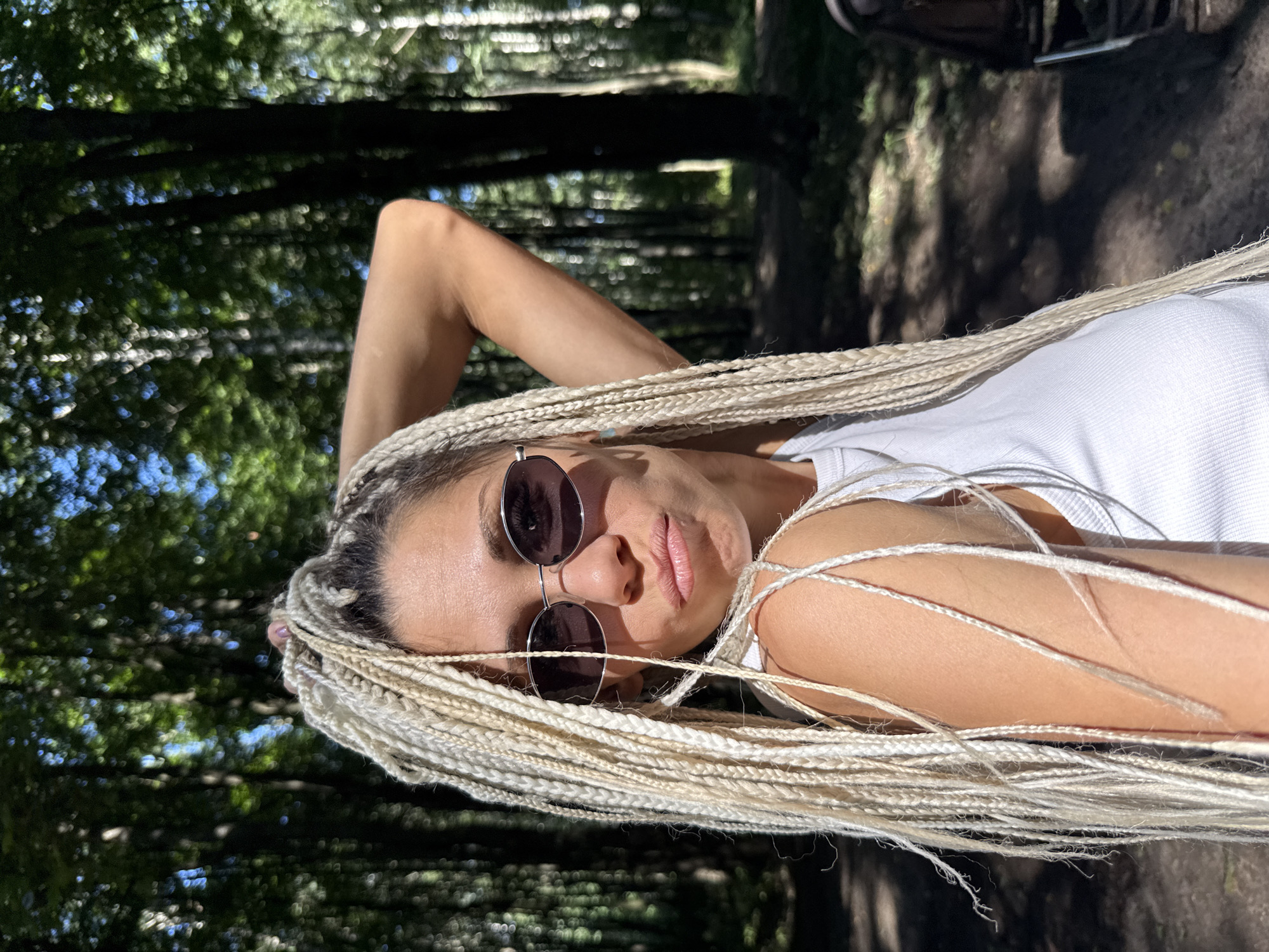 Sunny morning selfies in a Russian forest with a child nearby