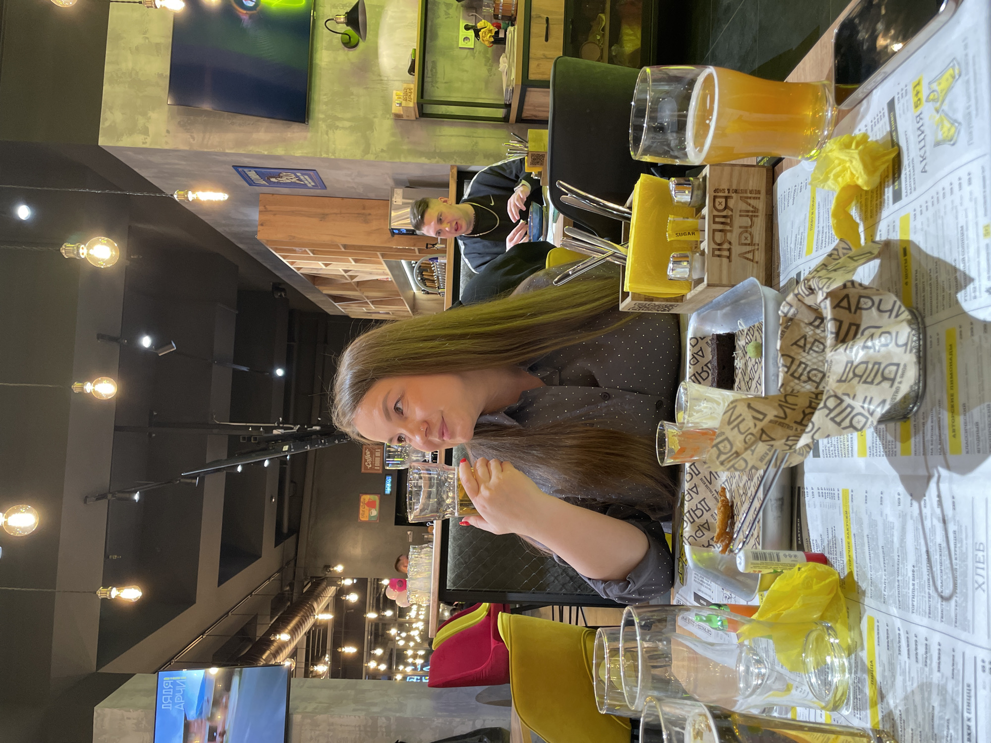 Two women dine together at Izhevsk restaurant