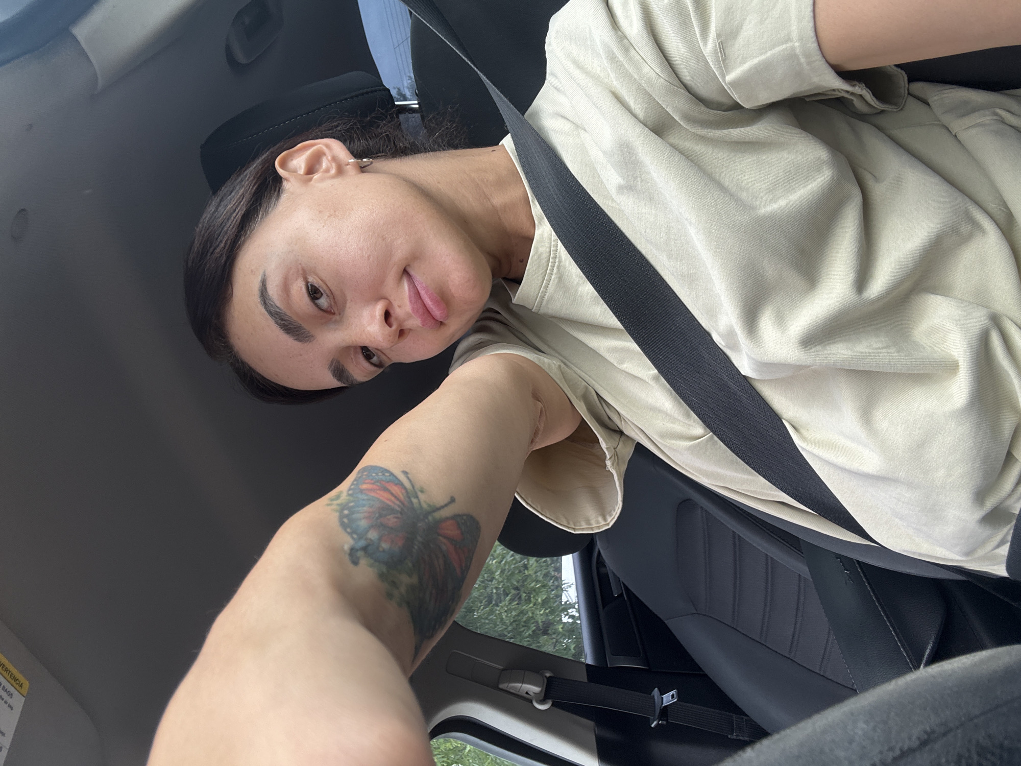 Inside a parked car in Tbilisi, quick selfie-style shots