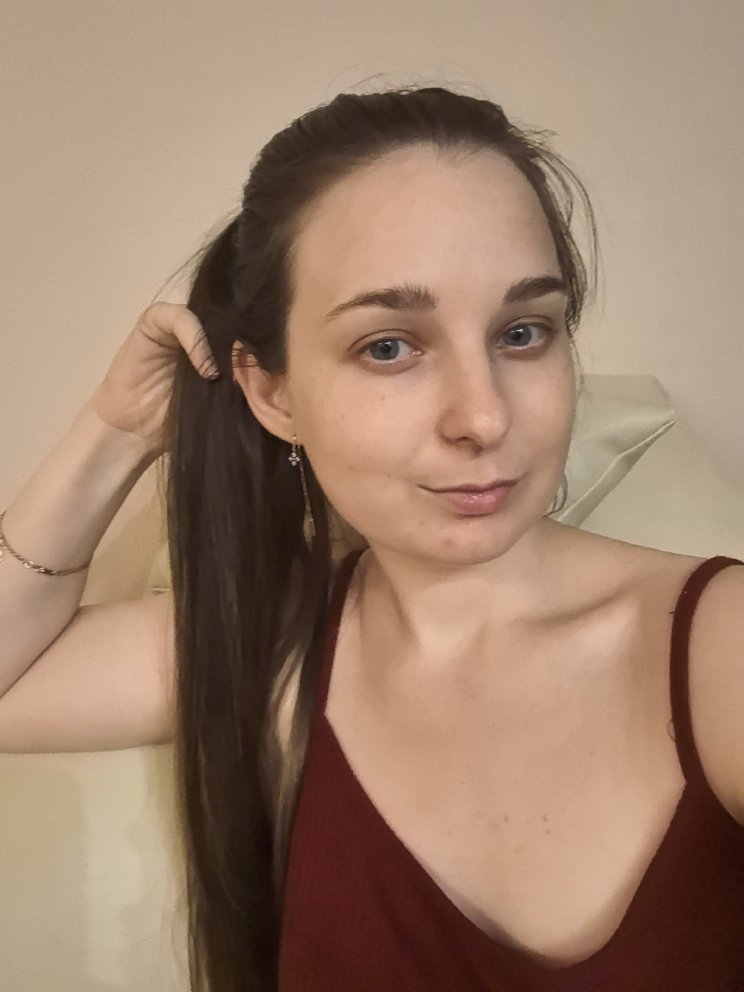Woman takes selfies, children play indoors in Moscow residence