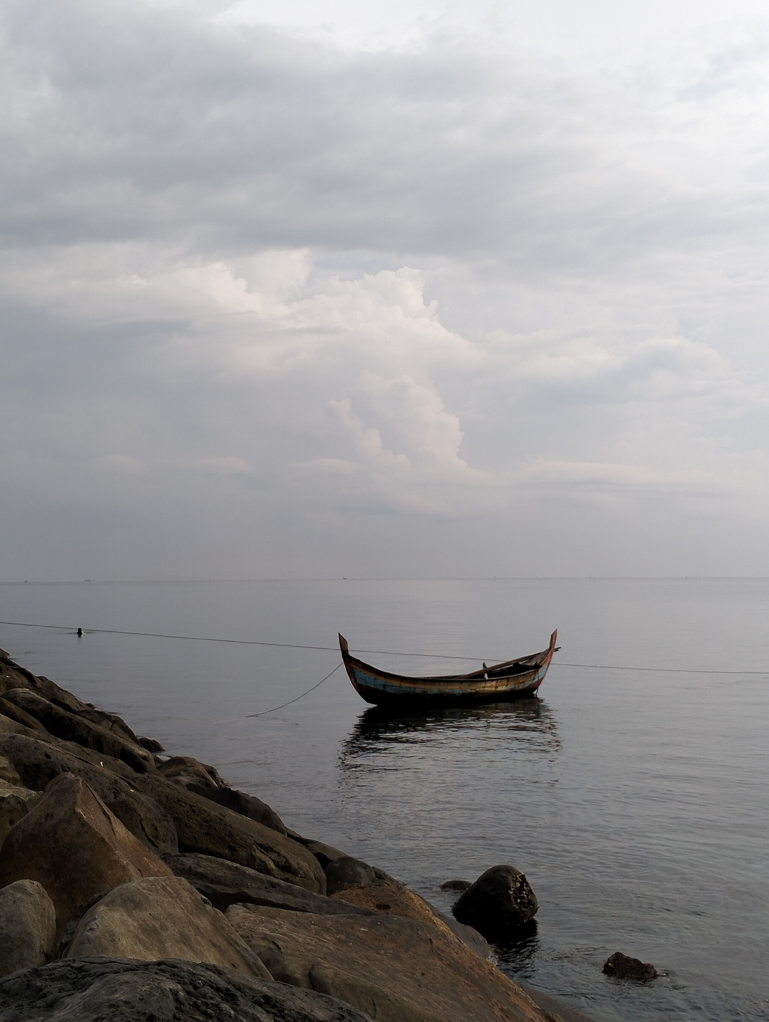 Fishing boat and cats observed on Lhokseumawe coast