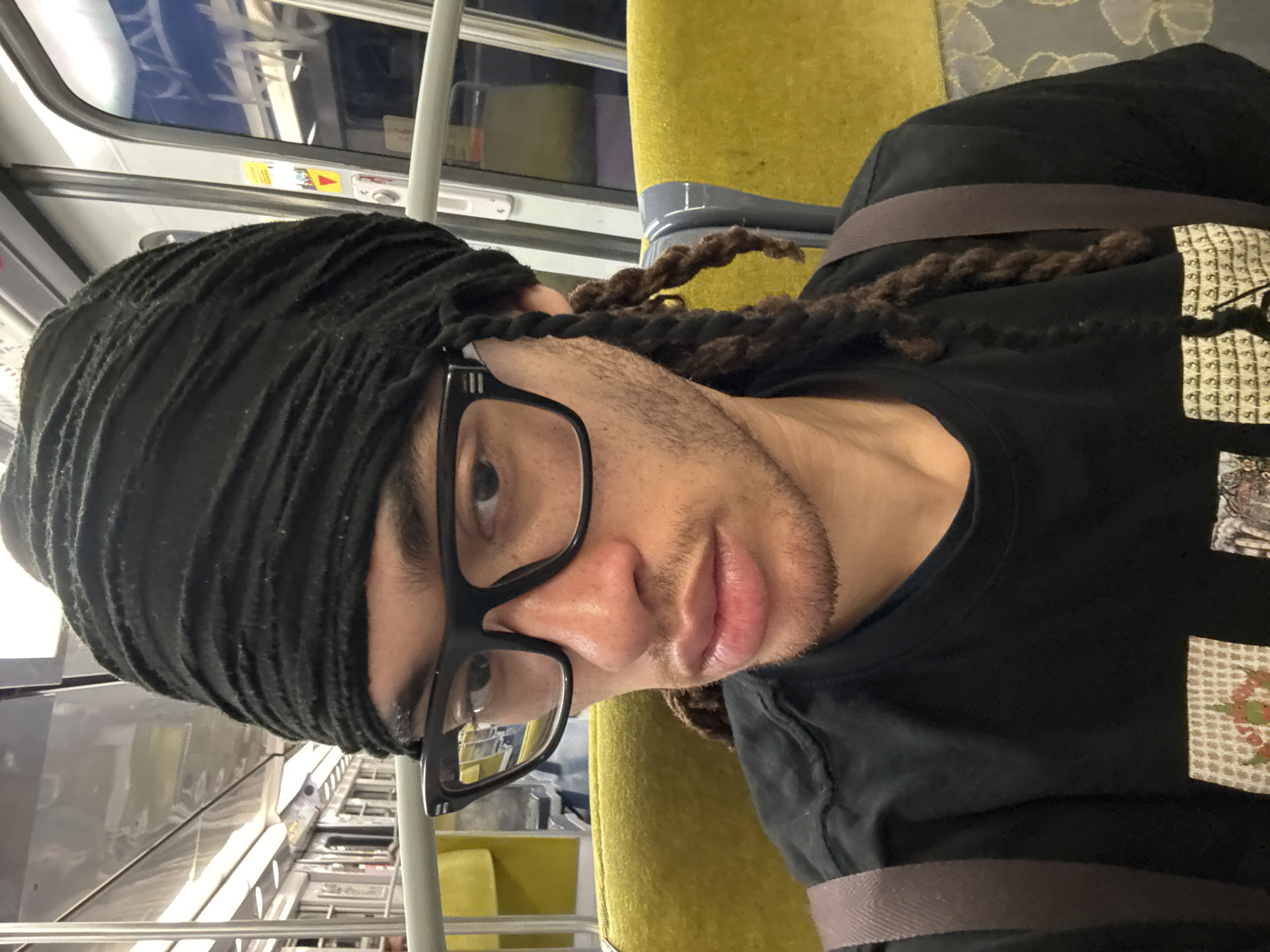 Person takes selfie on public transport in Arcueil