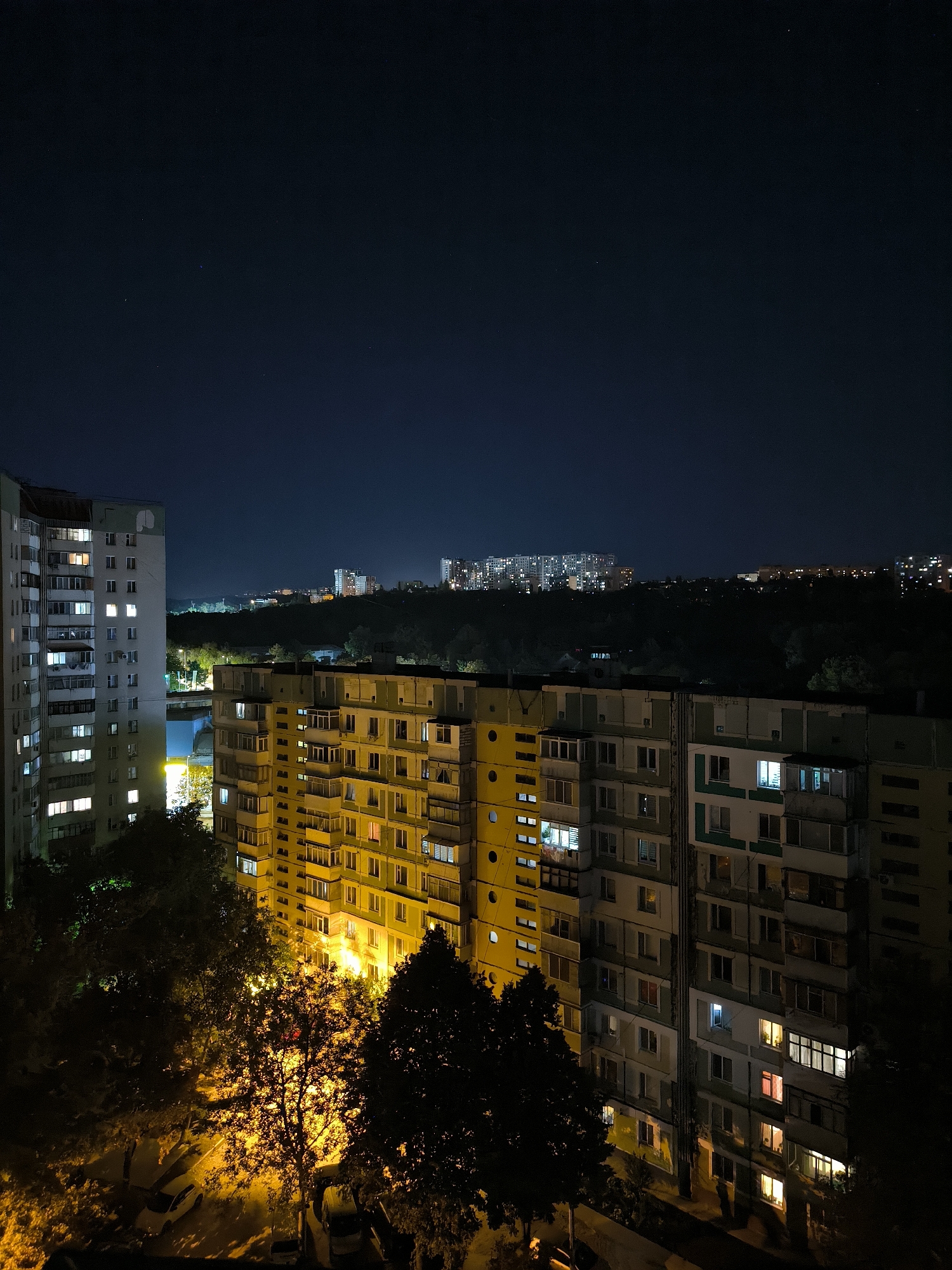 Rooftop night views over Chișinău's residential blocks
