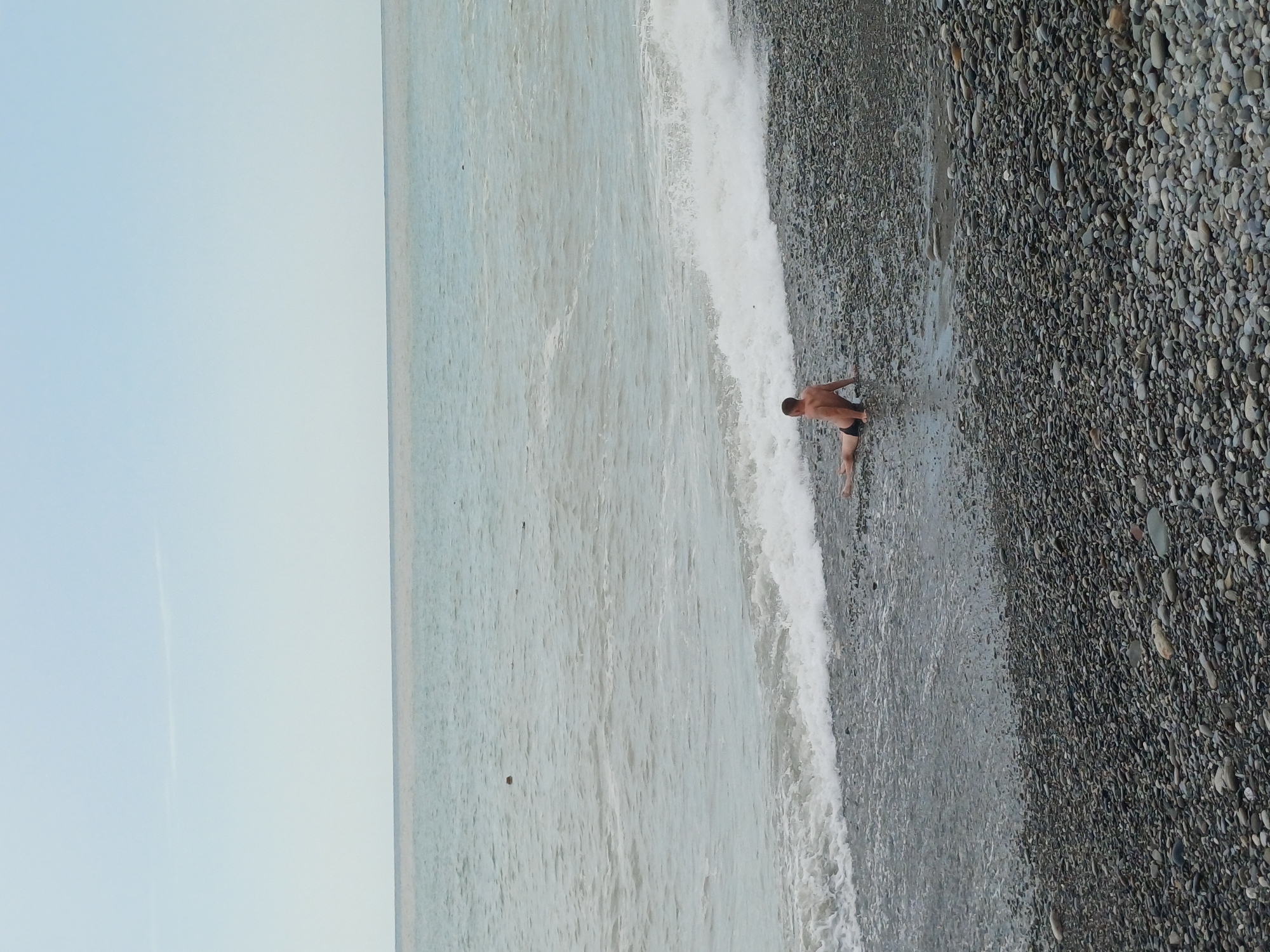 Quiet afternoon at the pebble beach on Sochi's coastline