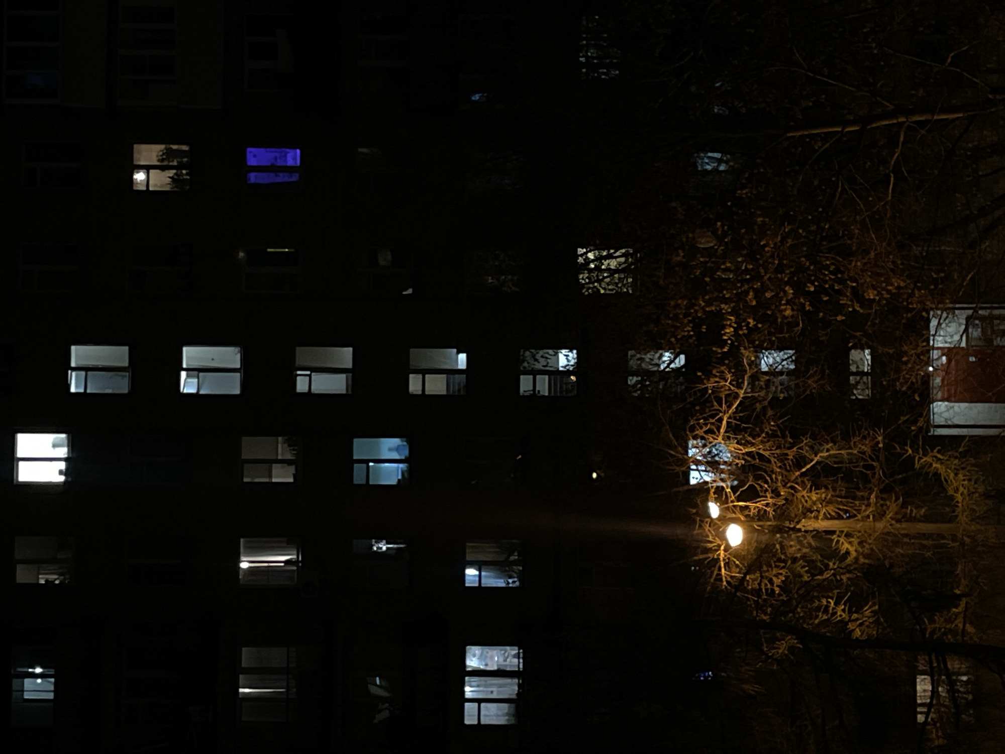 Evening observations of illuminated high-rise buildings in urban area