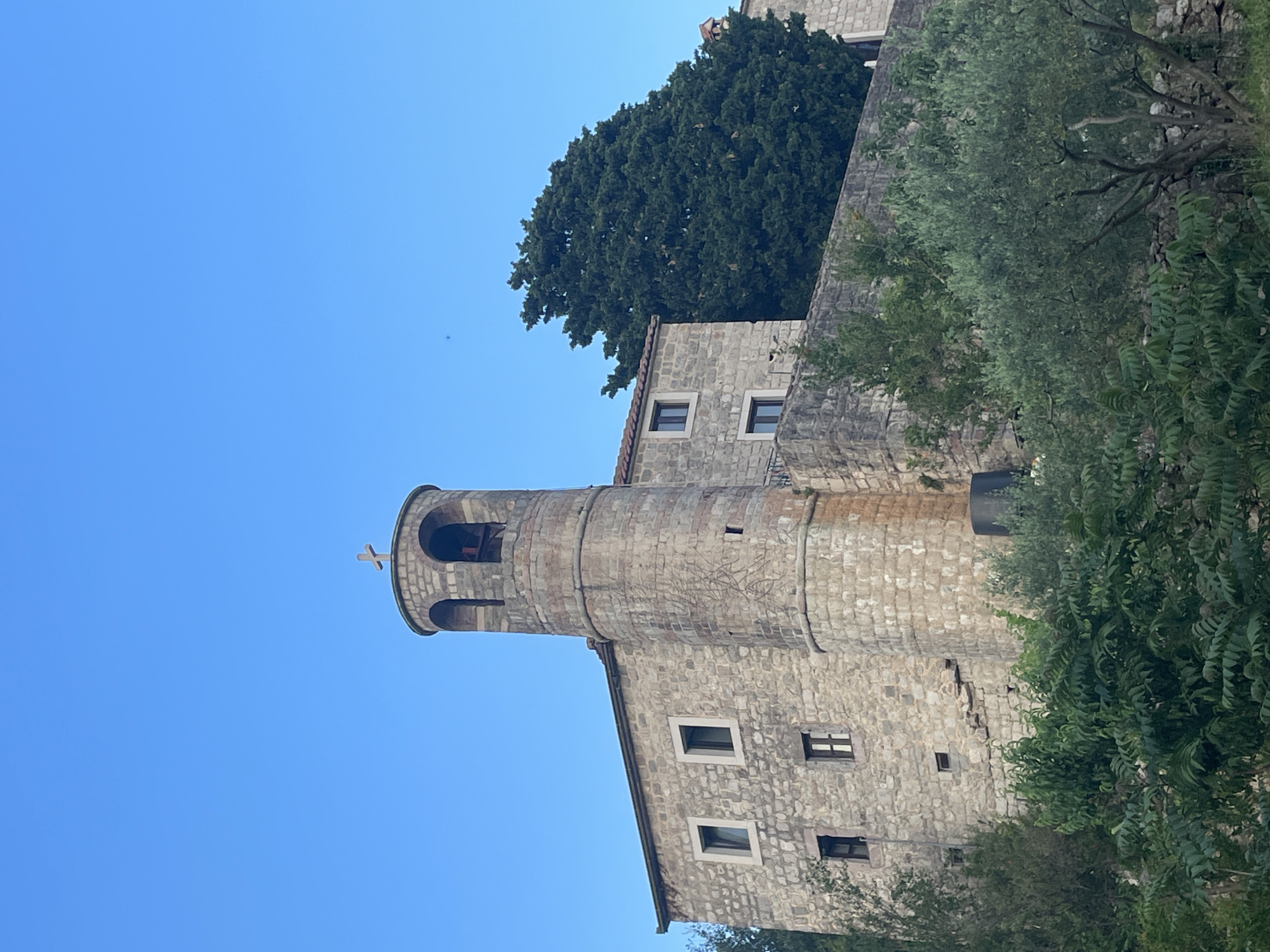 Podostrog Monastery stone bell tower documented in Montenegro