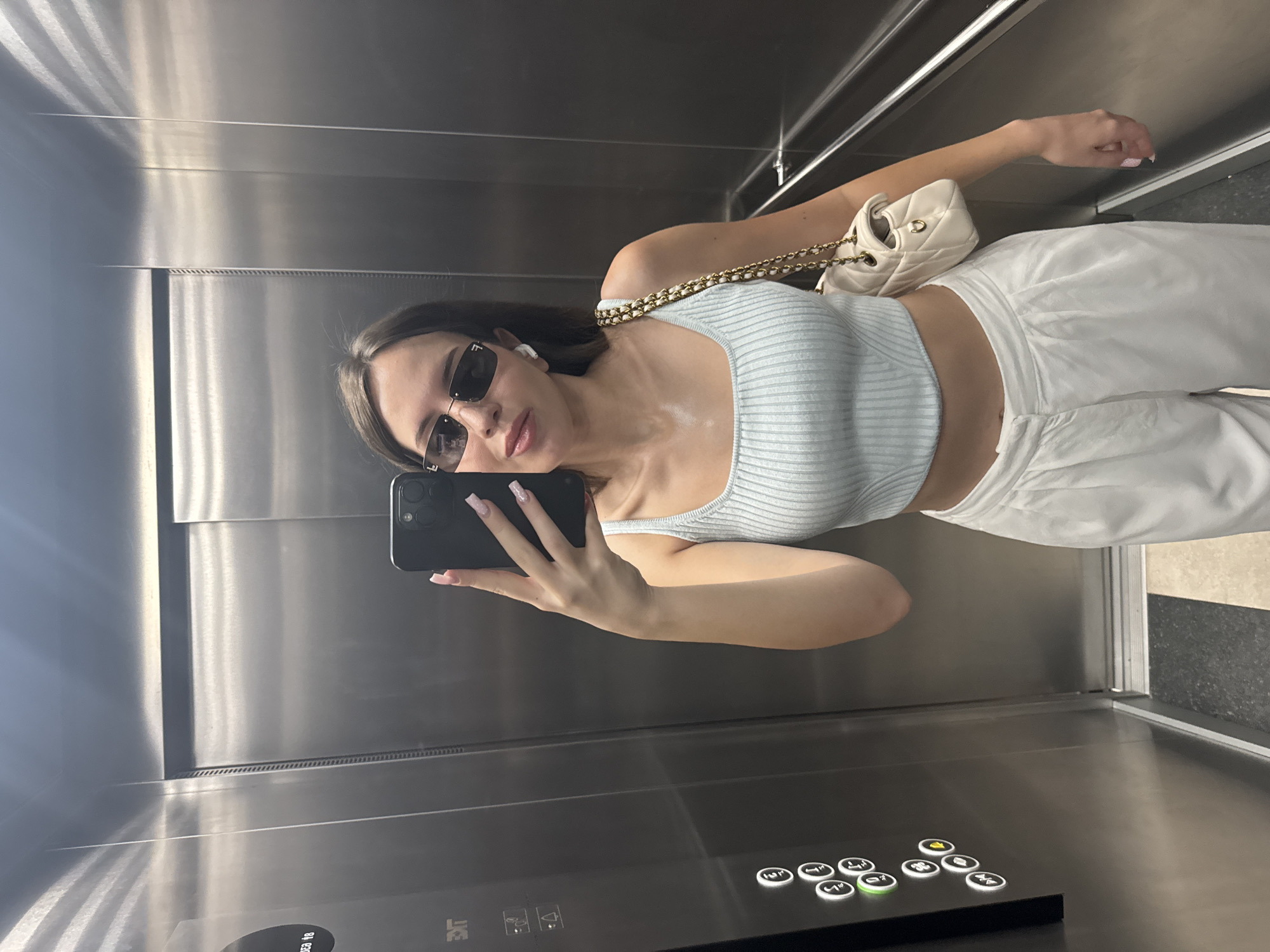 Elevator selfie to sunny outdoor shot, same morning look