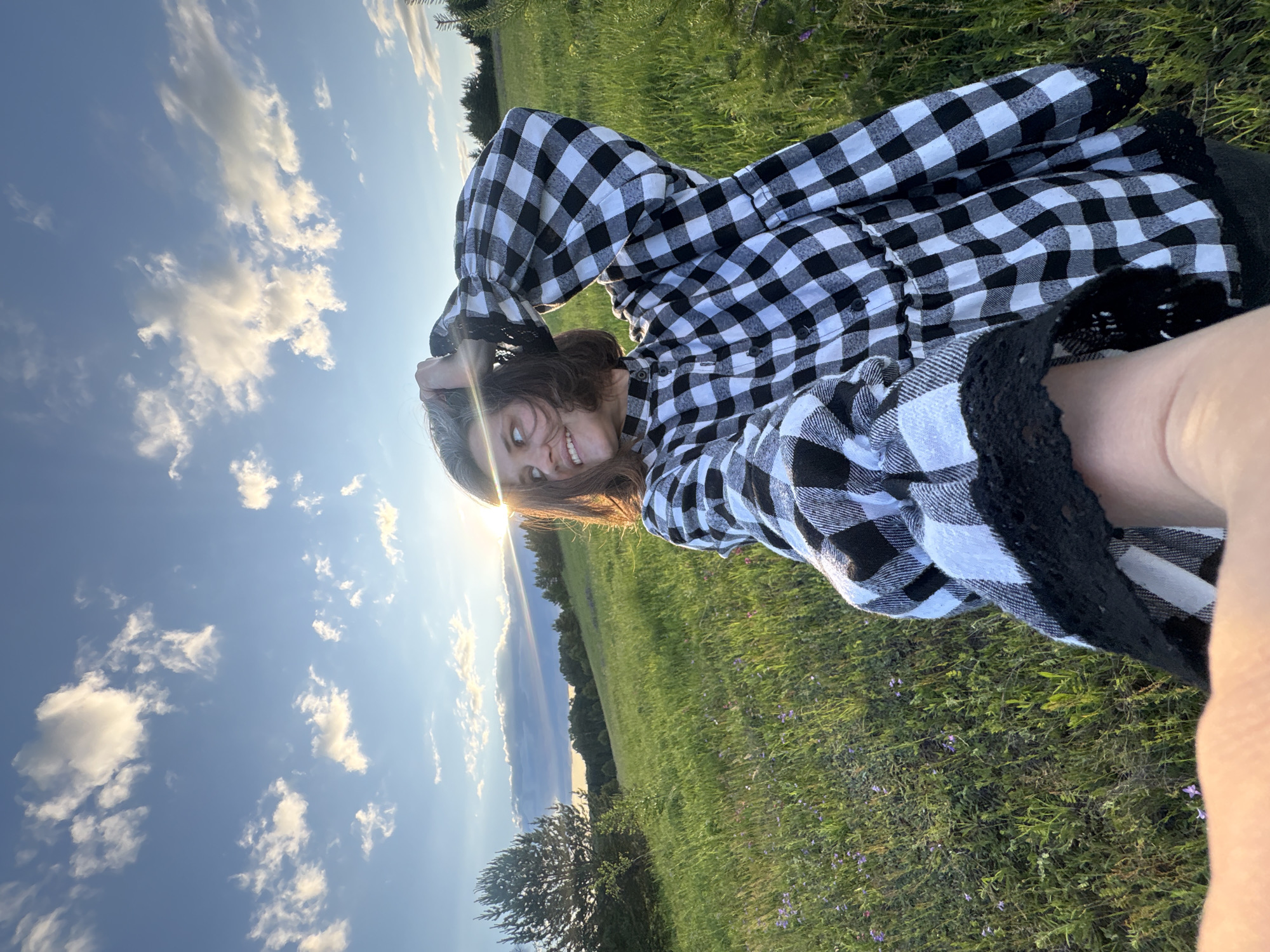 Woman in checkered outfit photographed at multiple outdoor locations