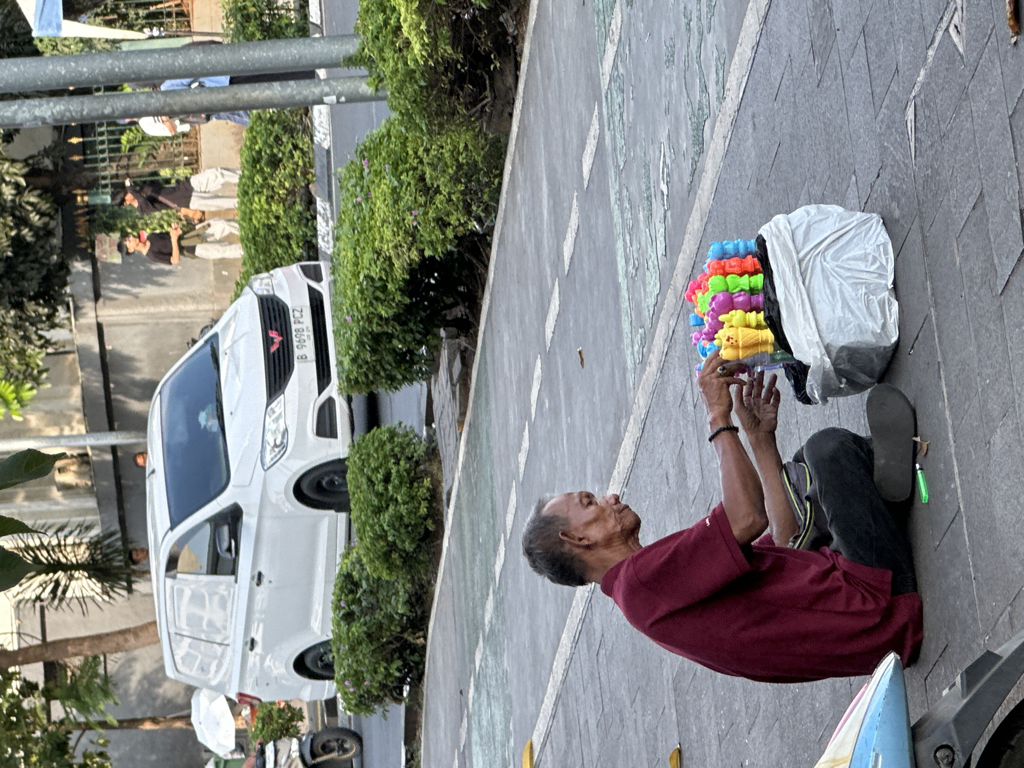 Ordinary street life documented across West Jakarta neighborhood