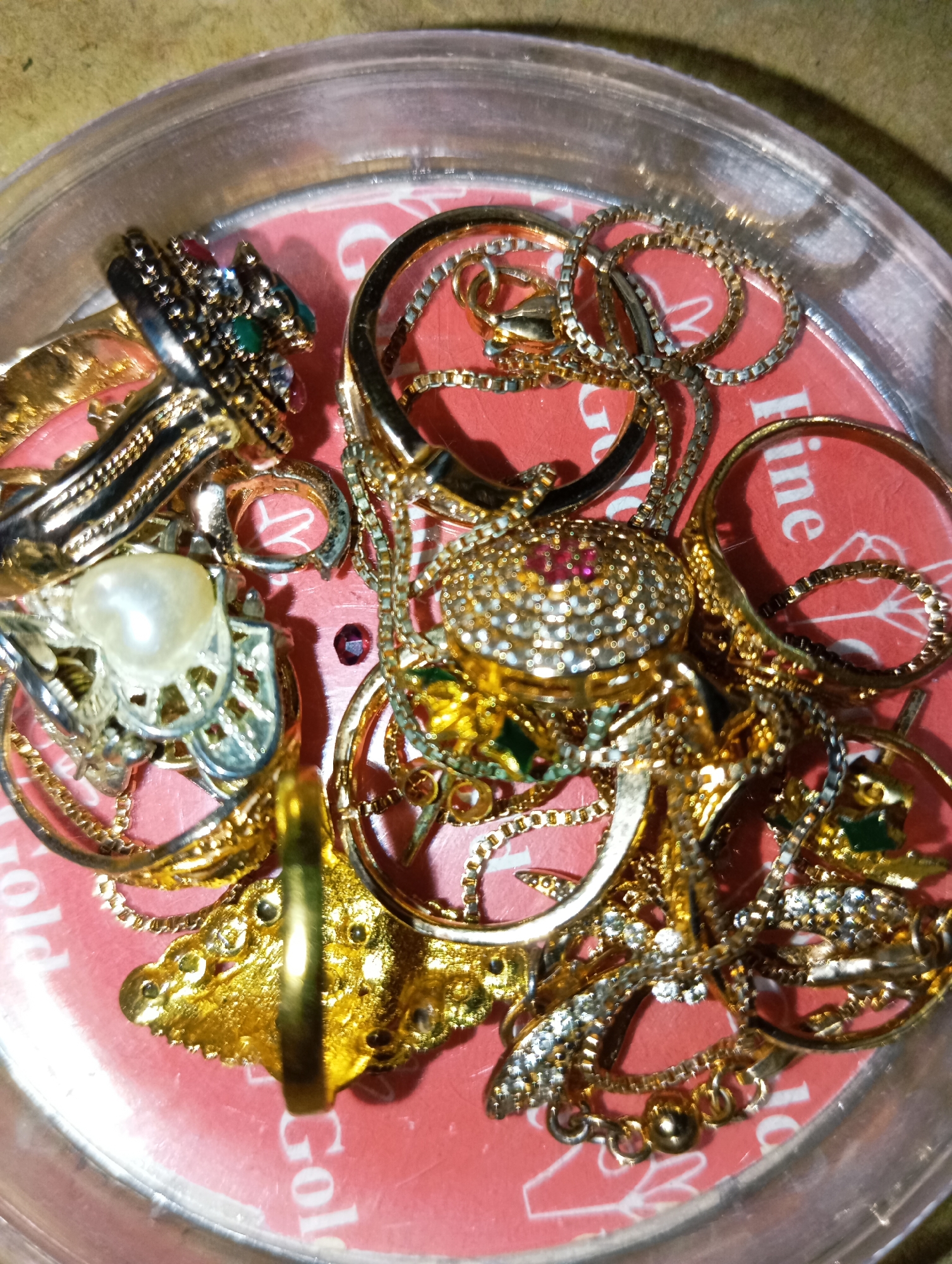 Closeup product shots of beauty items, jewelry, and accessories