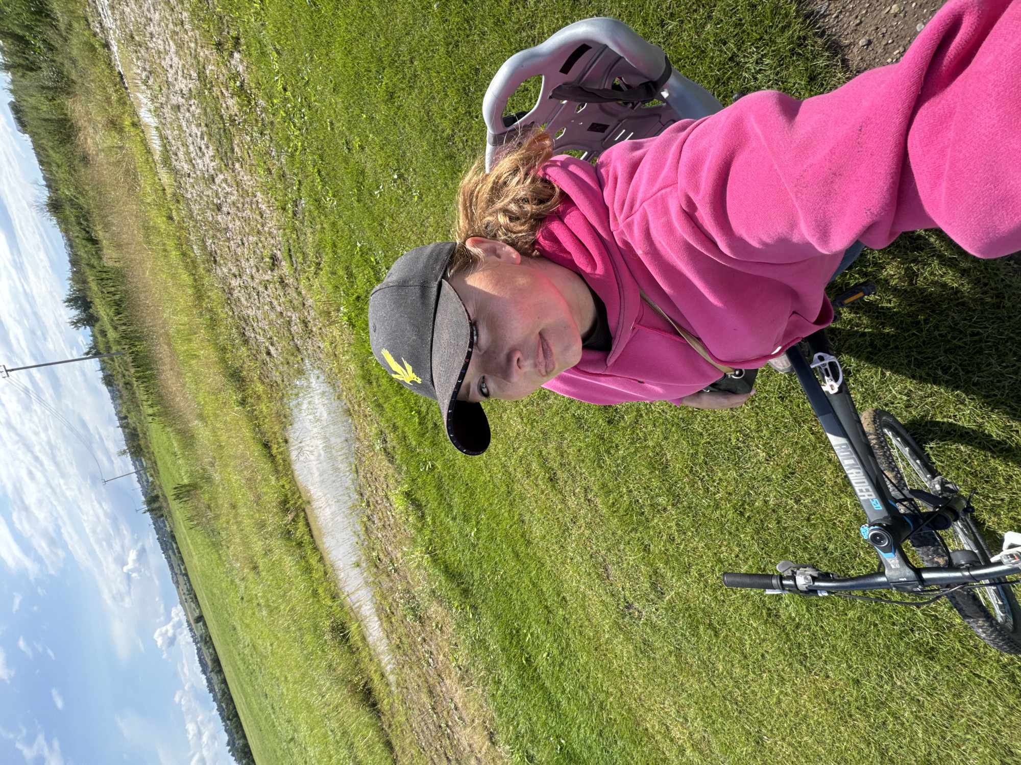 Cycling through flooded sod fields outside Innolovo, Russia