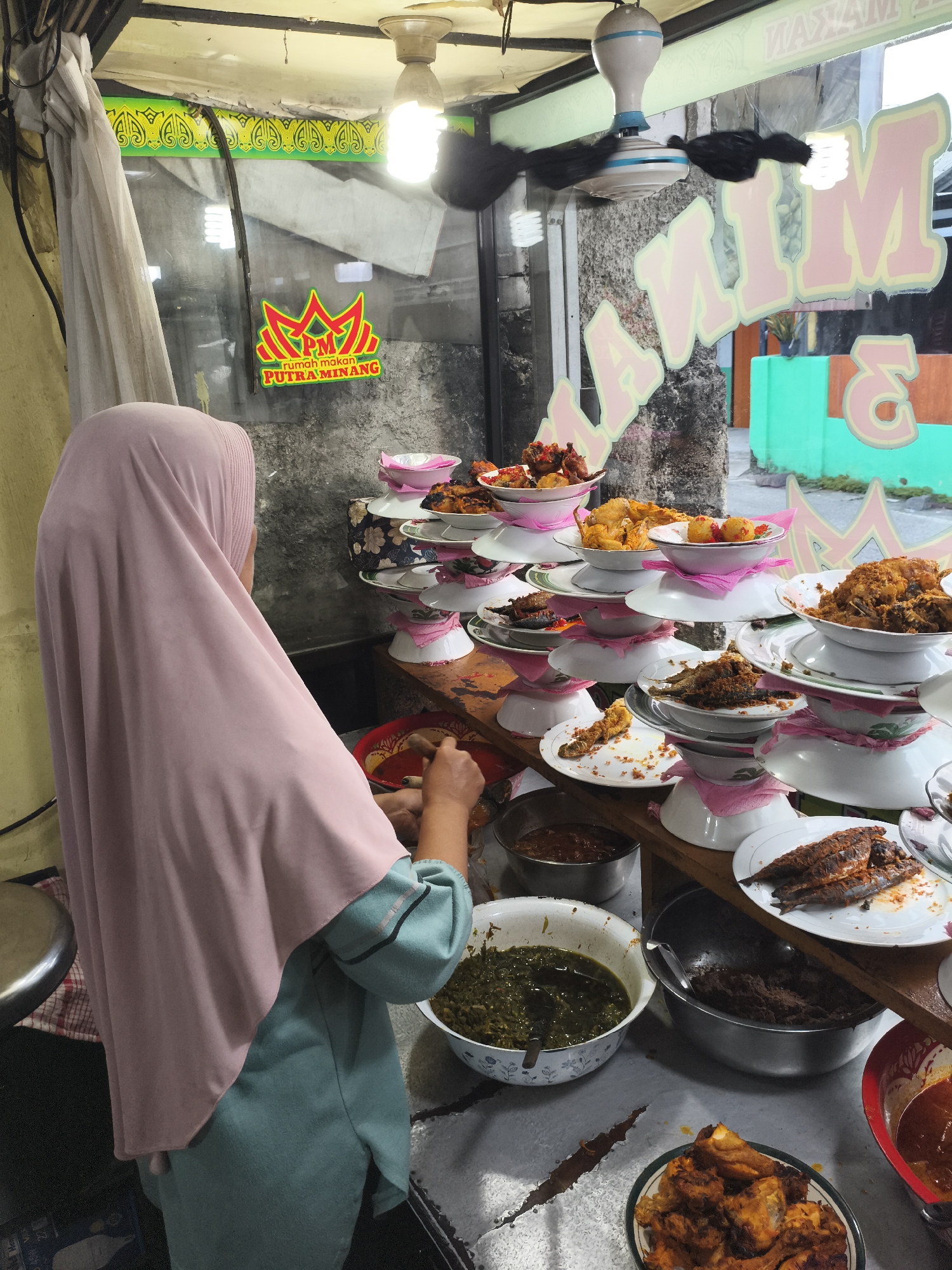 Morning street life documented across Depok, Indonesia commercial district