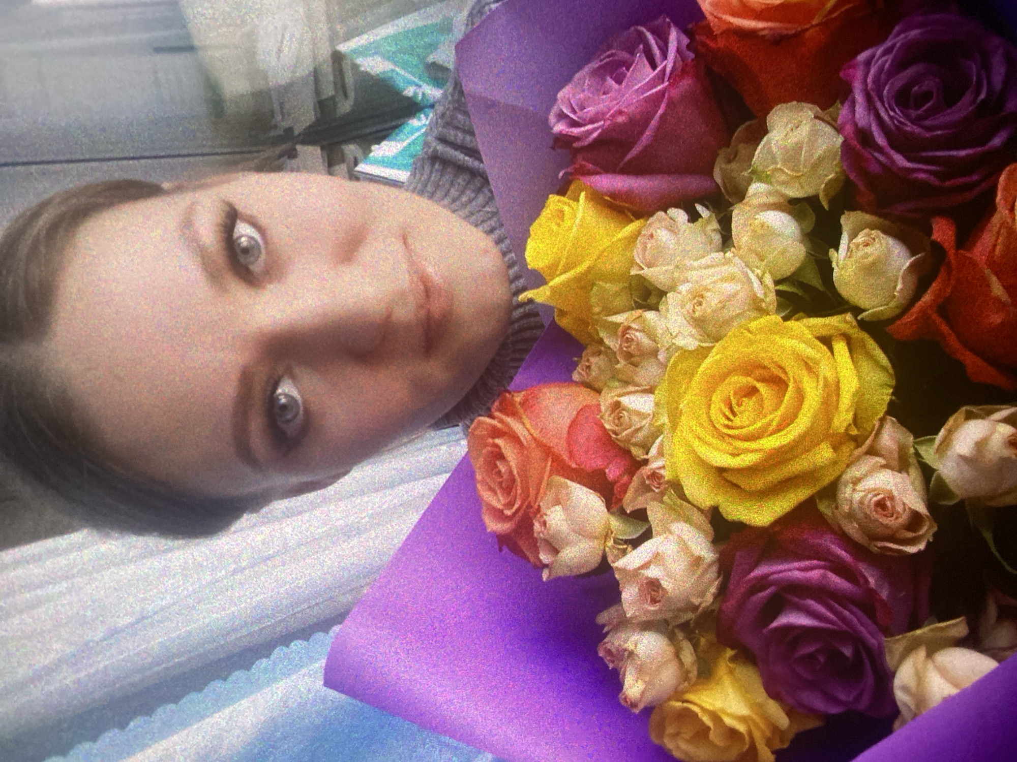 Woman with roses, cat spotted in Saint Petersburg evening
