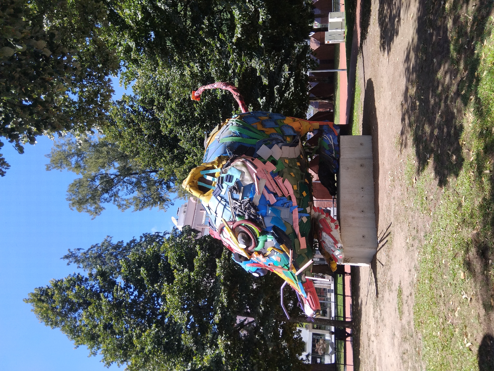 Colorful recycled-material animal sculptures in a Portuguese park