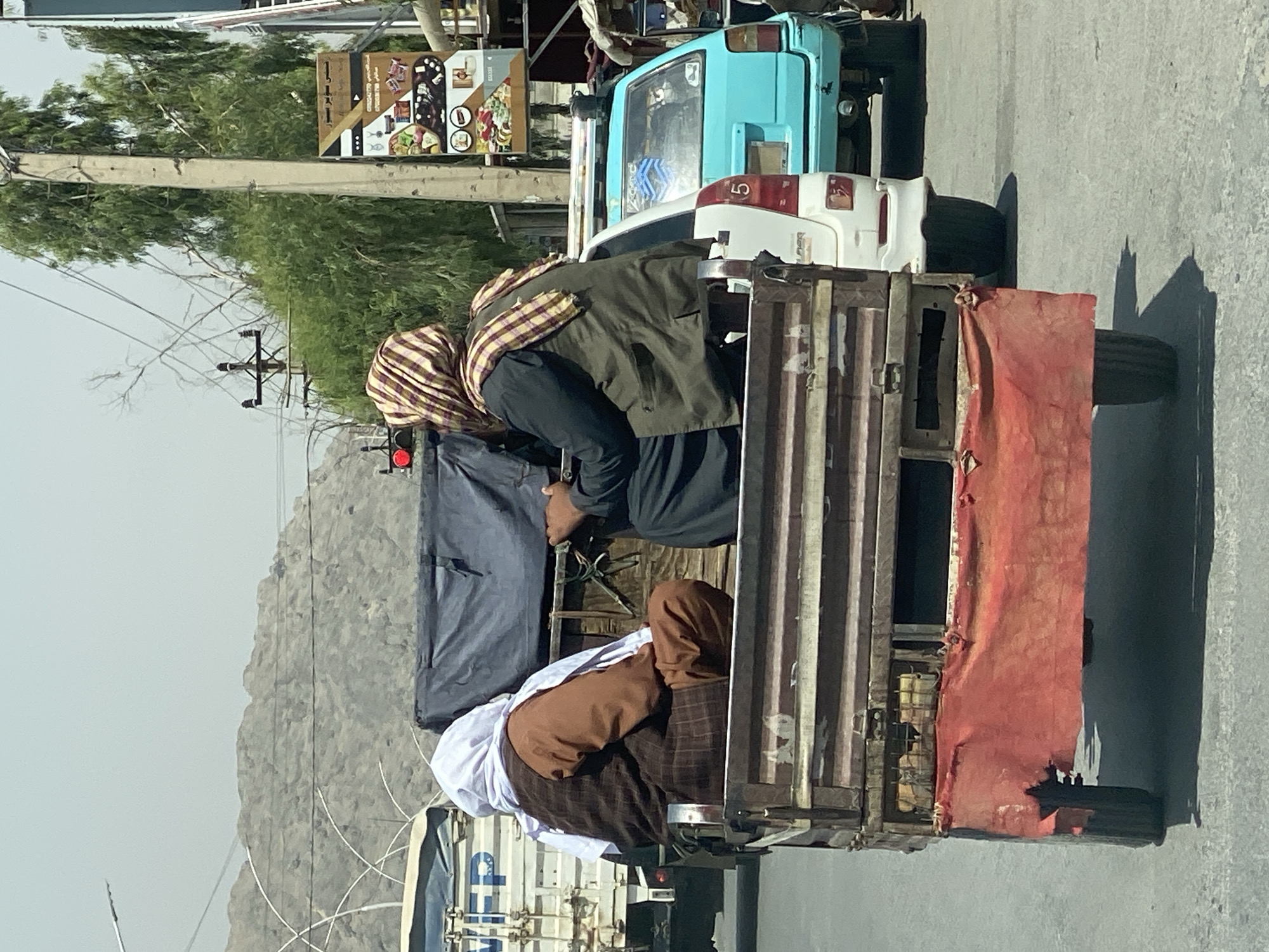 Everyday street life and construction activity in Kandahar