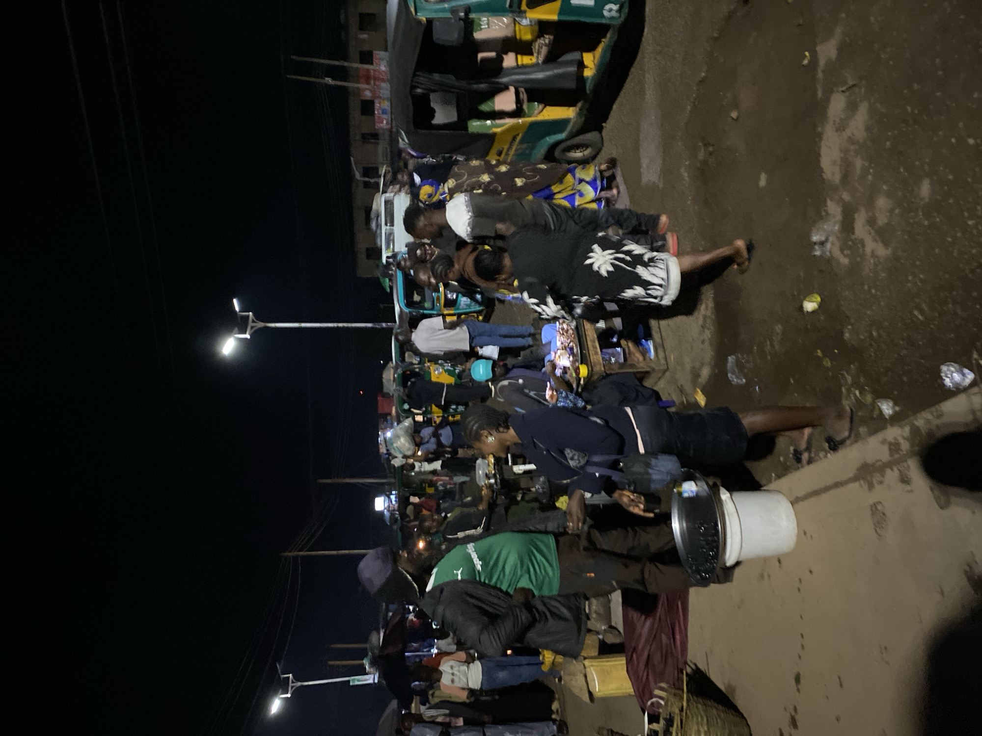 Evening street market activity documented in Bukuru, Nigeria
