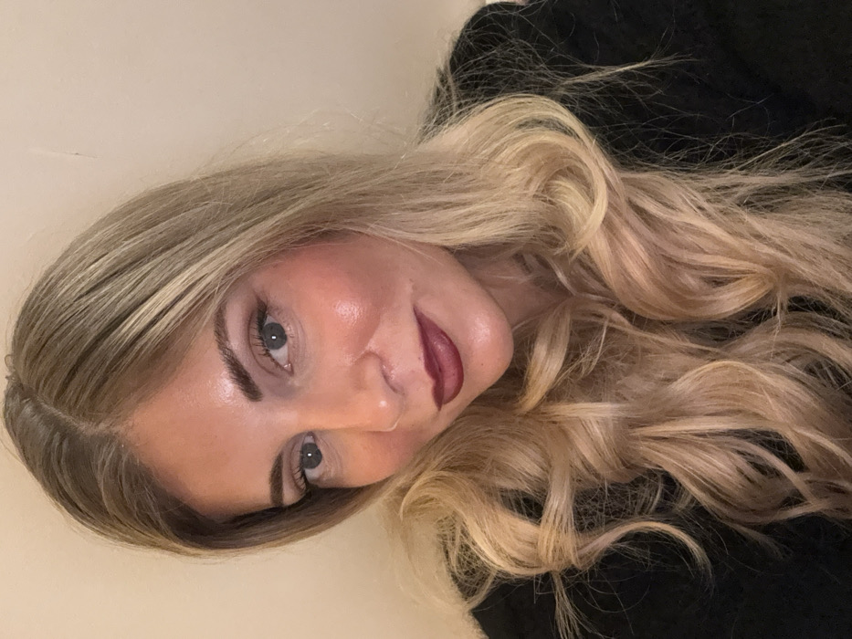 Woman documents evening selfie session in Paris residence