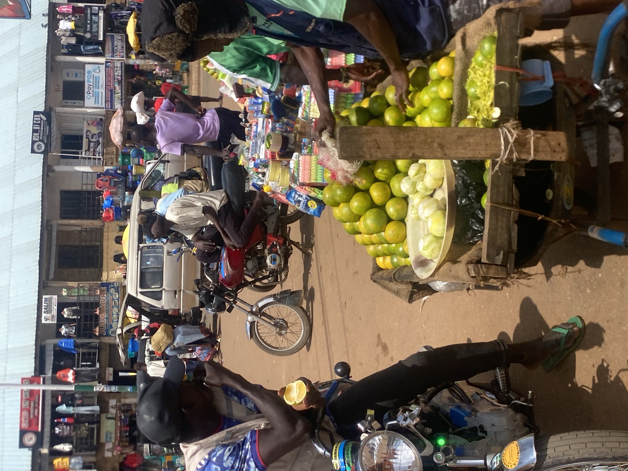 Midday hustle at a Bukuru street market, Nigeria