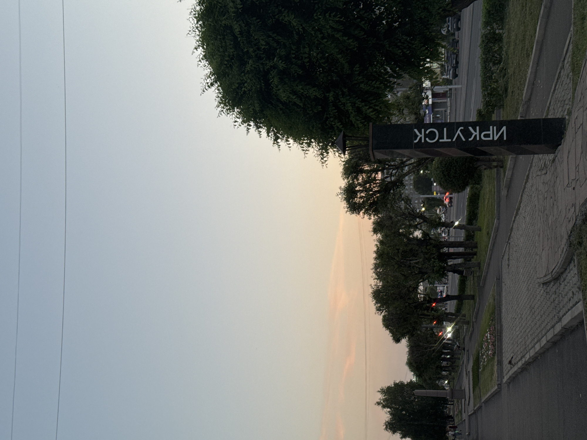 Krasnoyarsk streets: walkways, construction, and a landmark sign