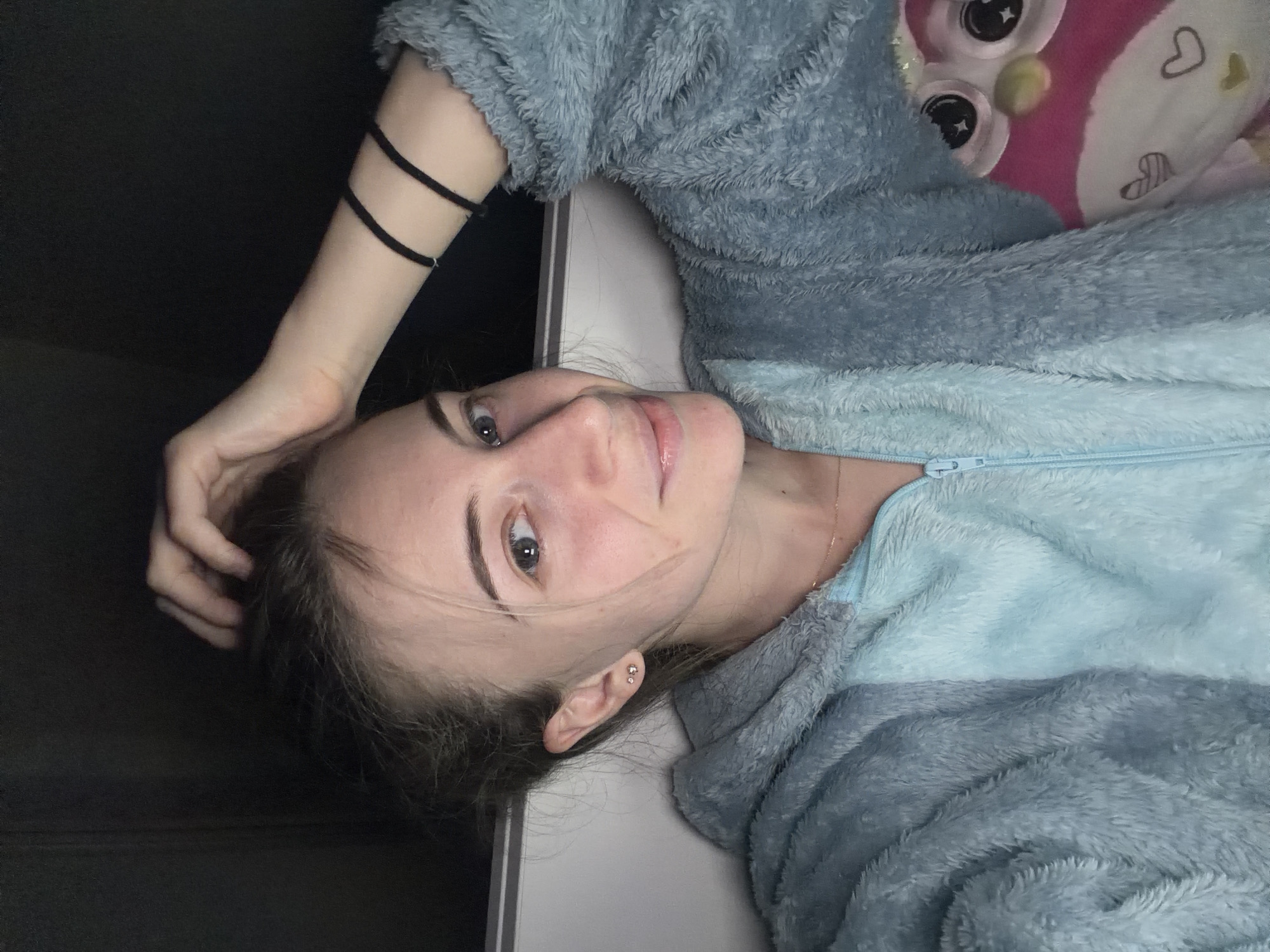 Woman Takes Selfies in Stitch Onesie in Plovdiv Bedroom