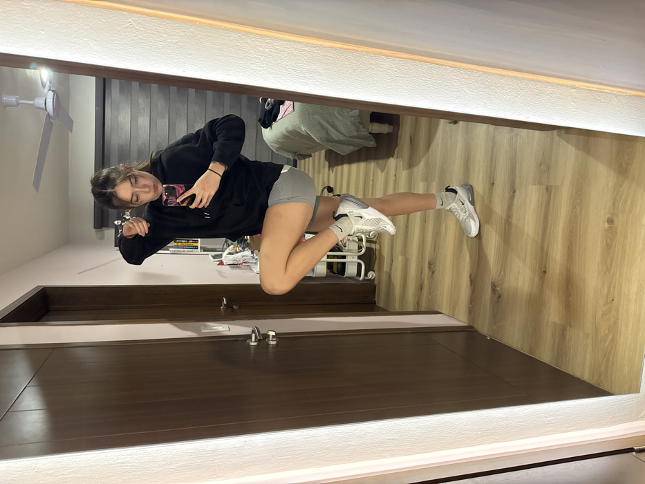 Woman Takes Mirror Selfies in Mexican Bedroom