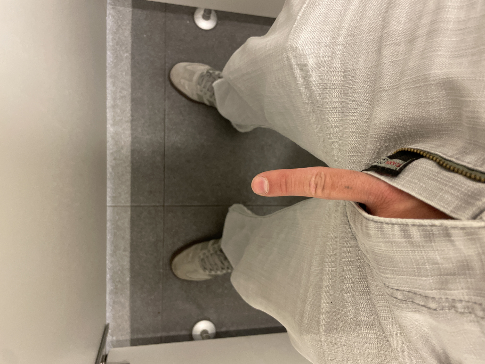 Indoor documentation captures bathroom scenes and empty convention space