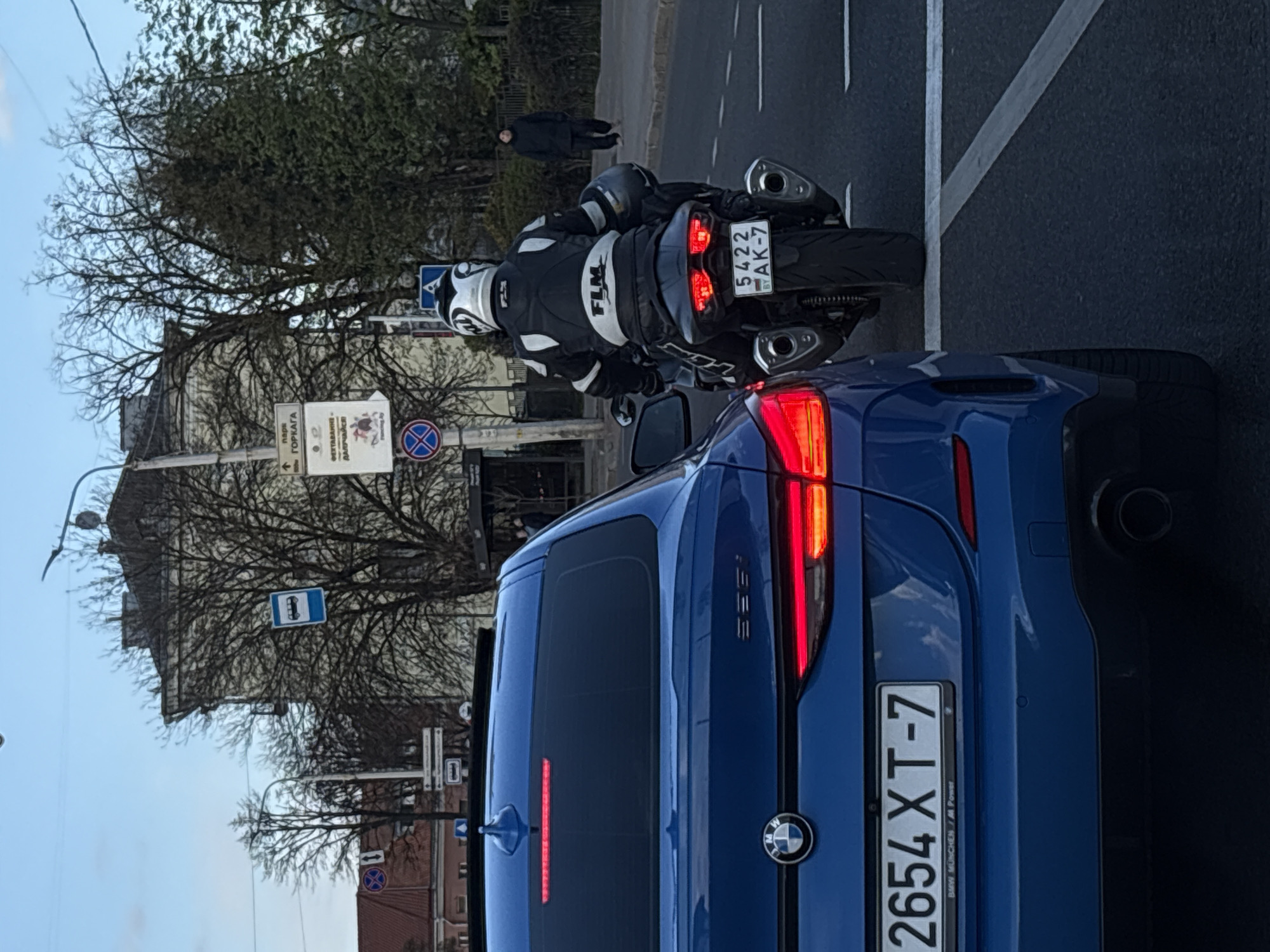 Blue BMW observed in daytime traffic on Minsk street
