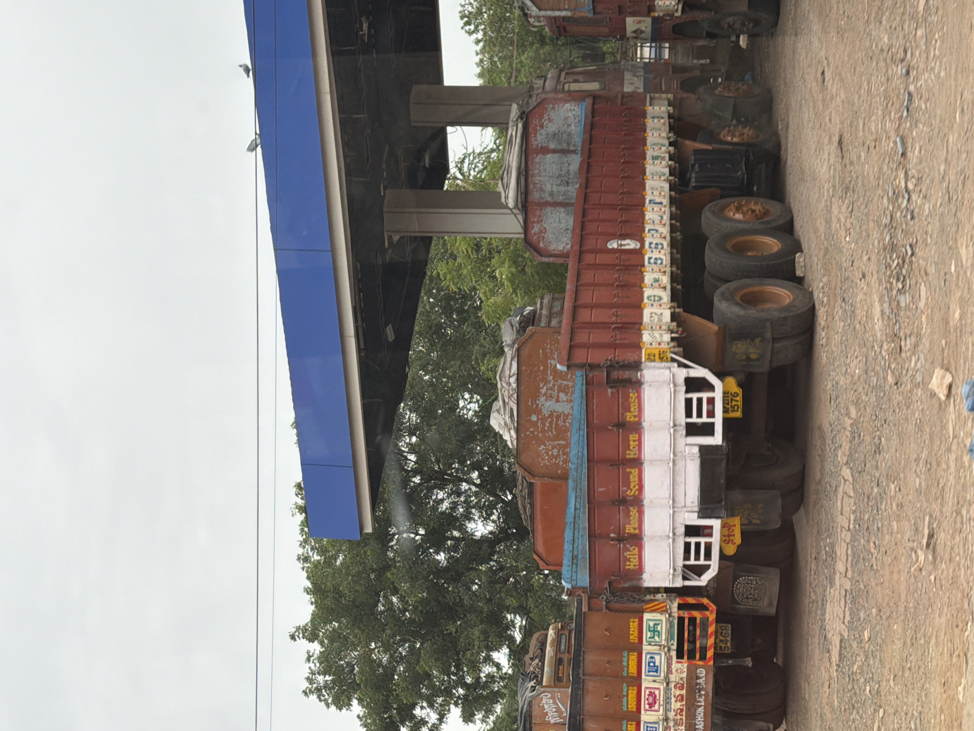 Trucks, streets, and a gold-spired temple in Bethamcherla