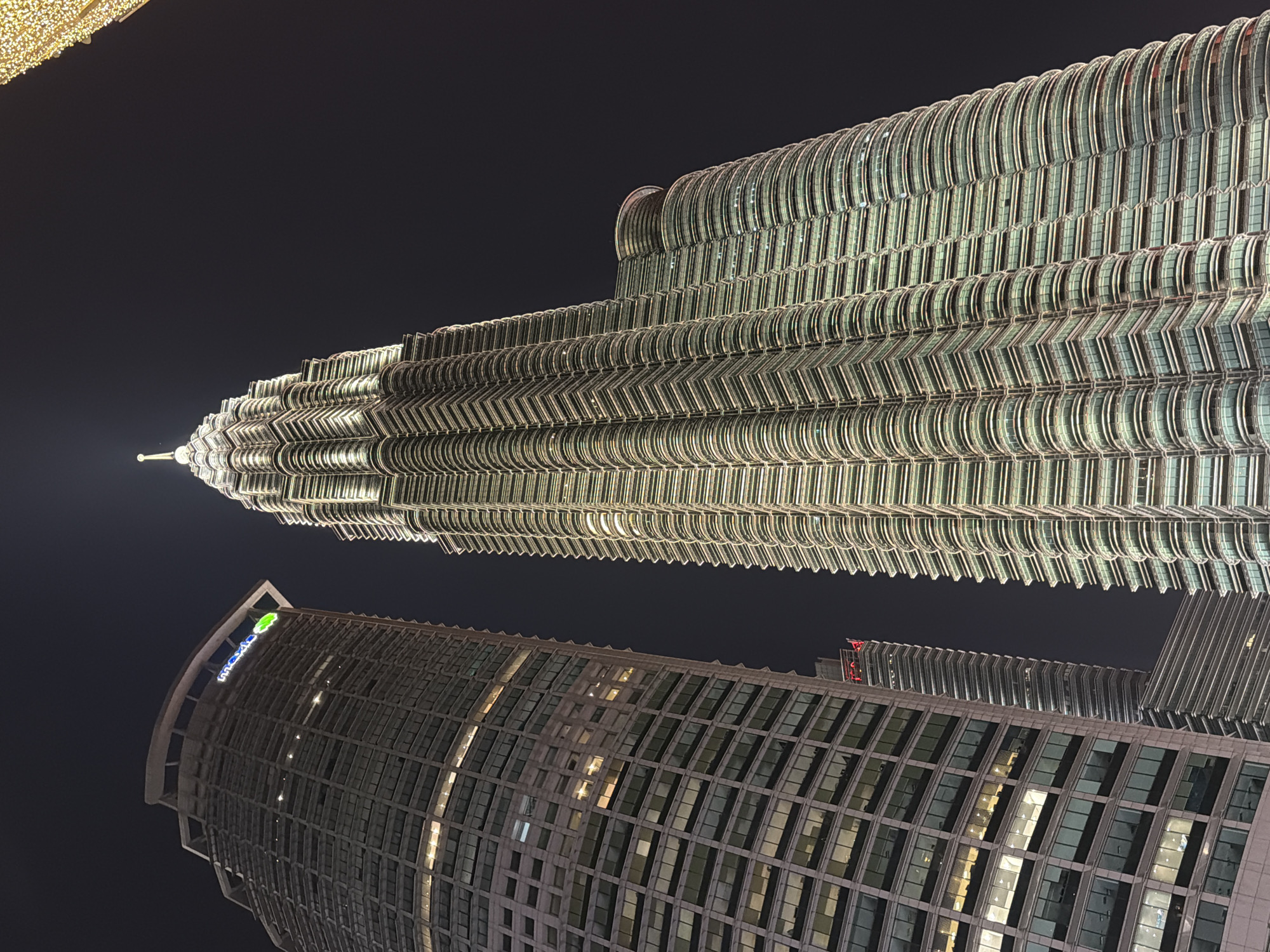 Nighttime scenes captured at Petronas Towers and Bukit Bintang