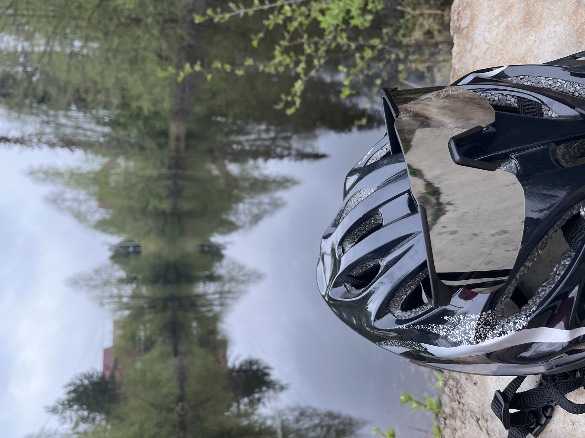 Cyclist's outdoor session documented near waterfront in Chaikovsky, Russia